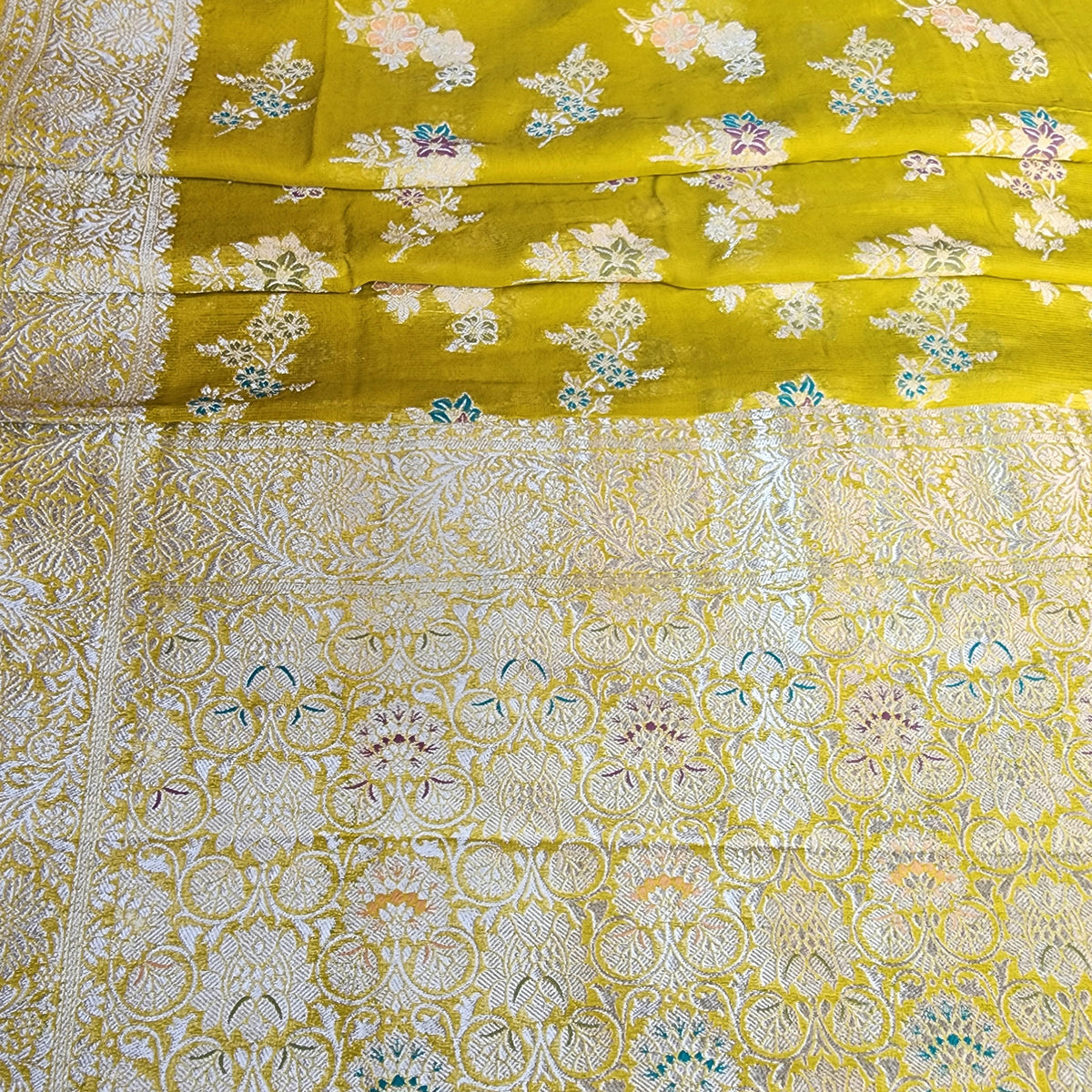 Yellowish Green Muslin Silk Saree with Floral Weave