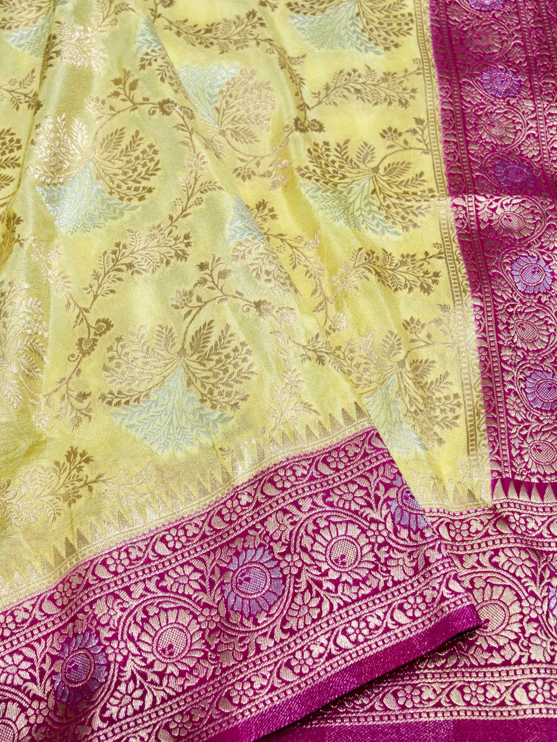 Lemon Yellow Crepe Georgette Silk Saree with Fuchsia Pink and Champagne Gold Border
