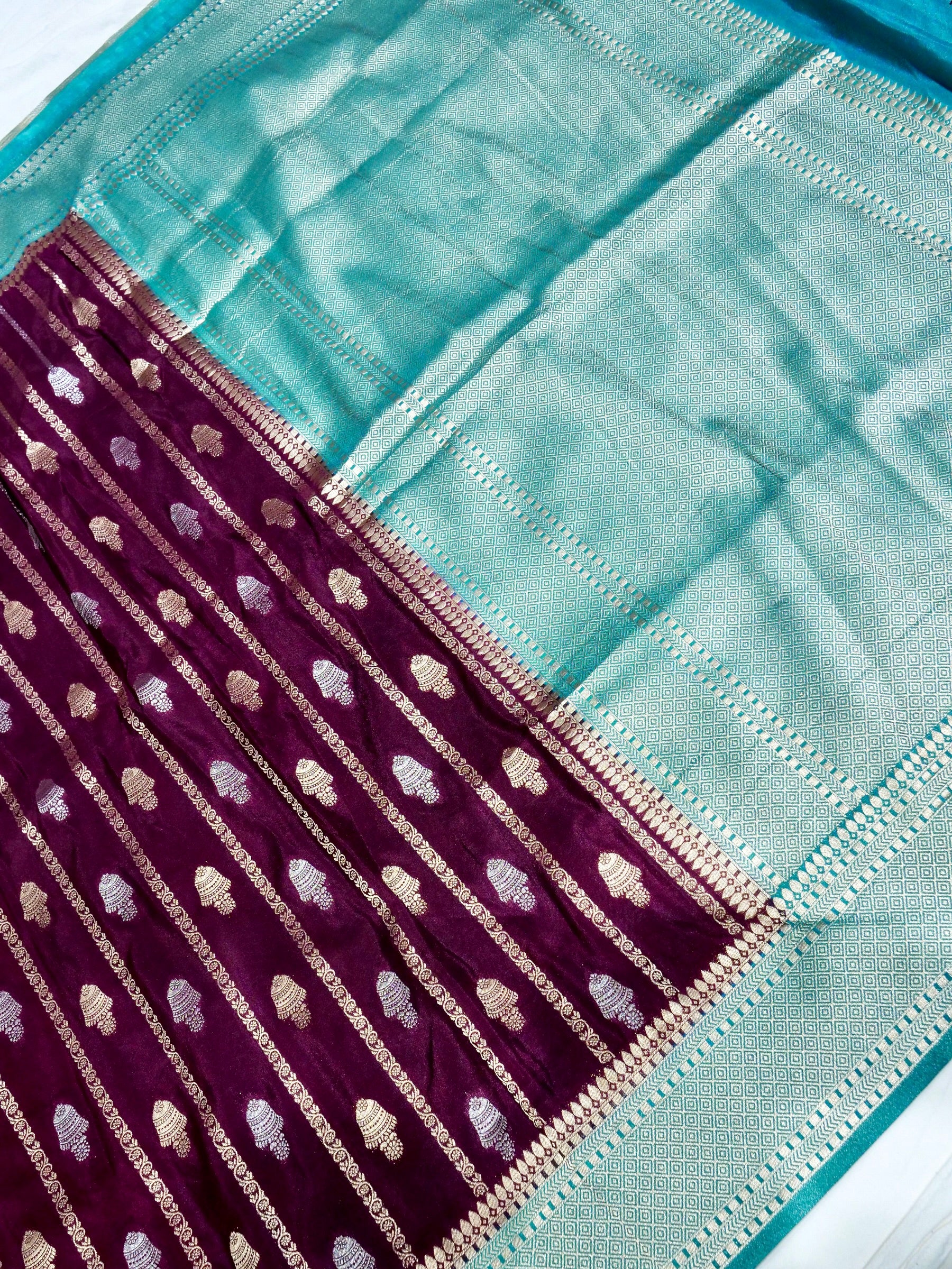 Wine Purple Crepe Georgette Silk Saree with Aqua Blue Border