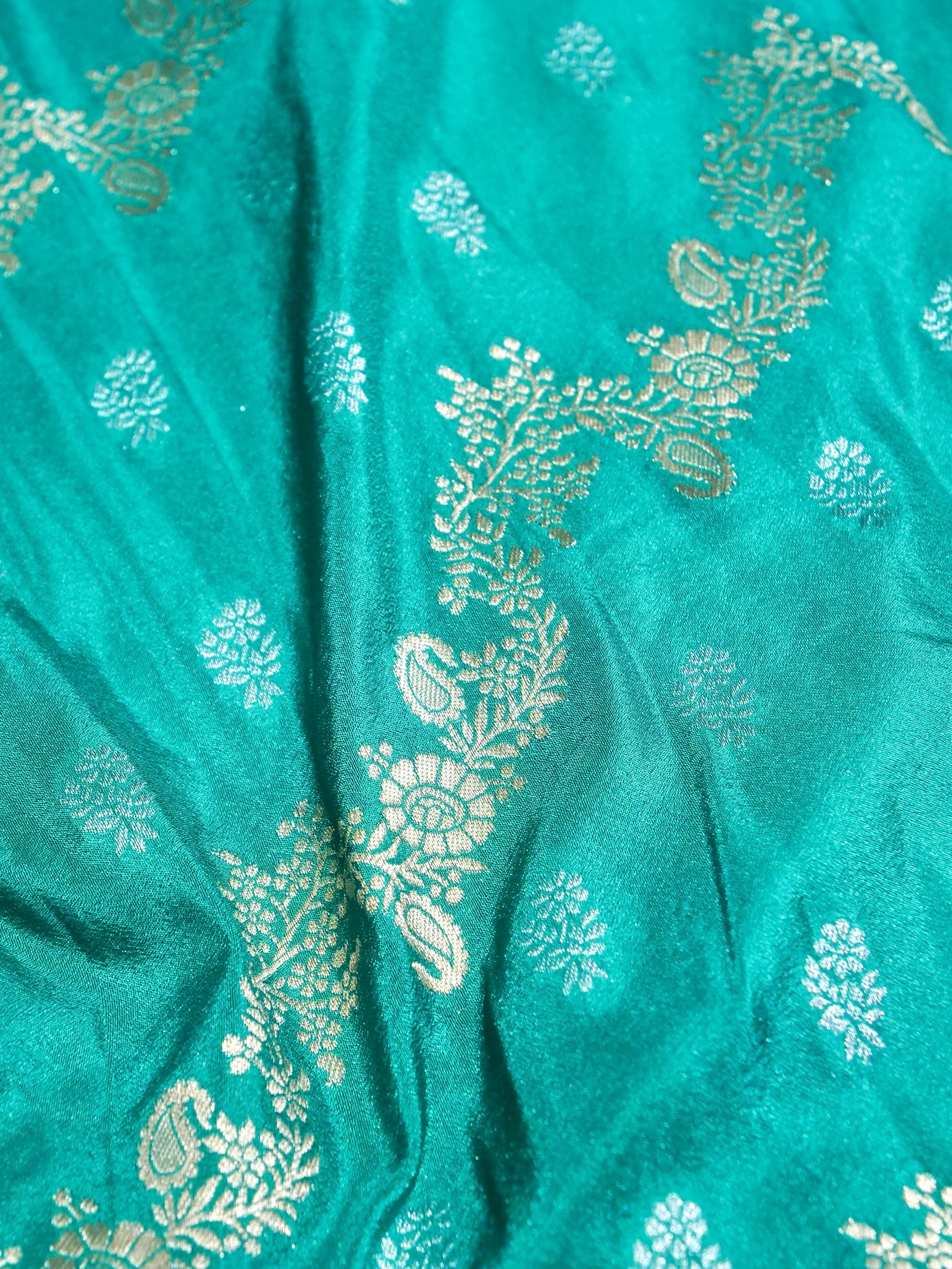 Teal Green Crepe Georgette Silk Saree with Champagne Gold Border
