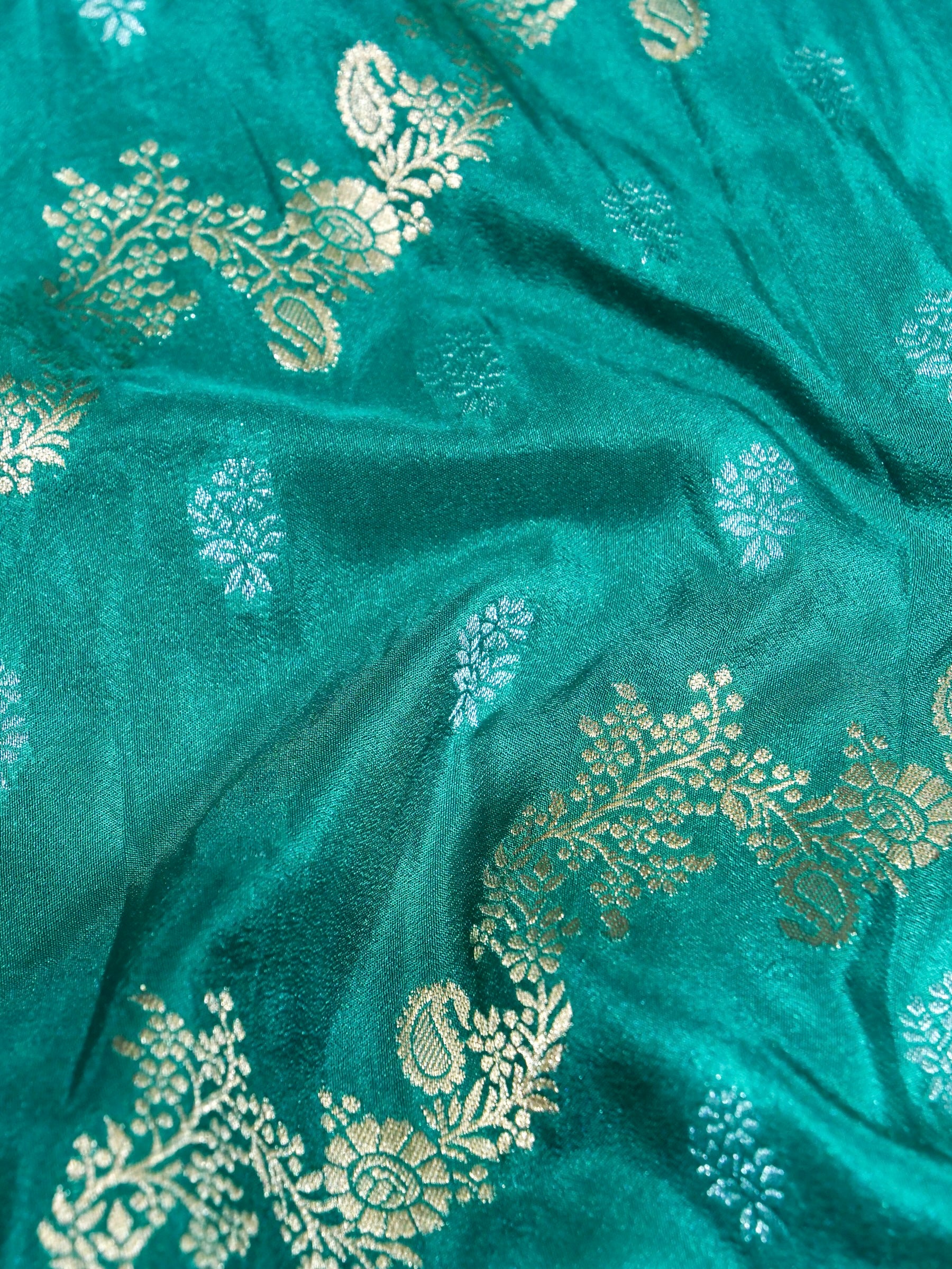 Teal Green Crepe Georgette Silk Saree with Champagne Gold Border