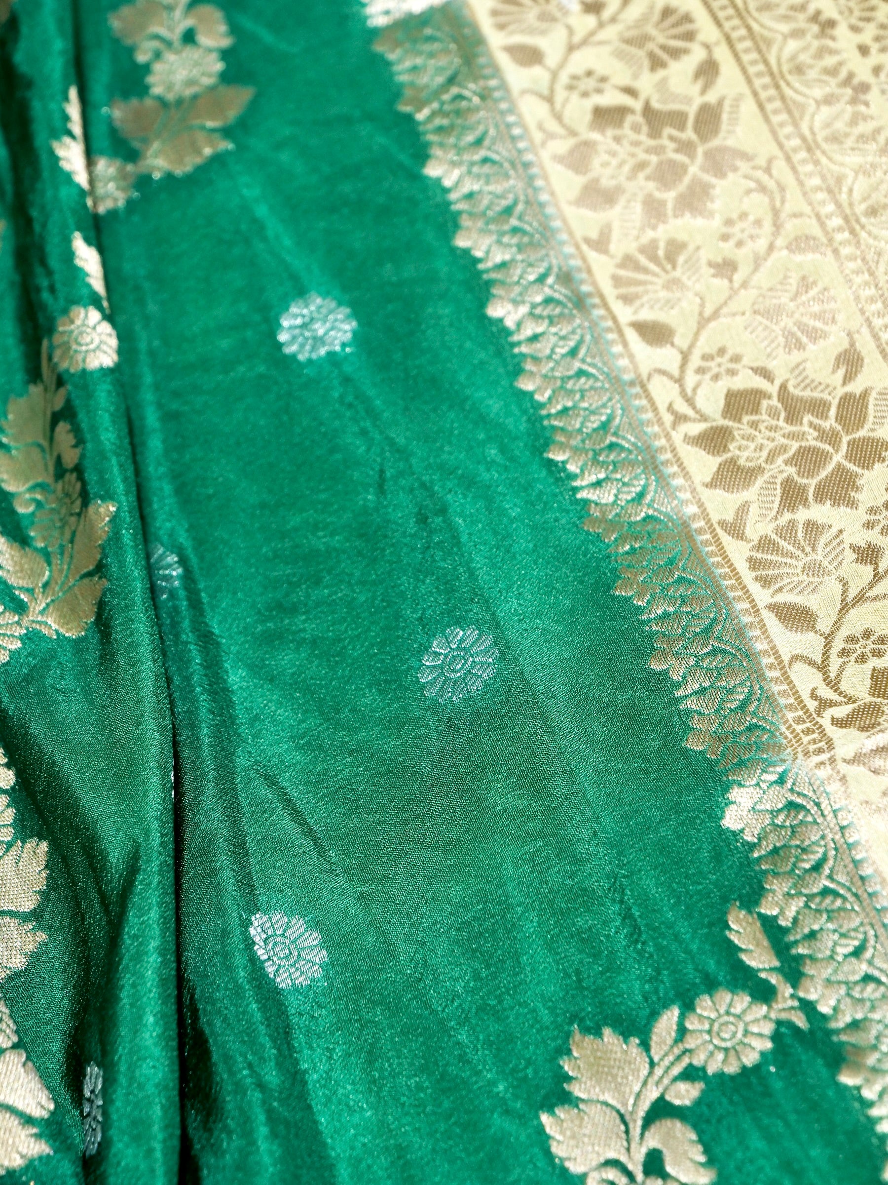 Emerald Green Crepe Georgette Silk Saree with Champagne Gold Border