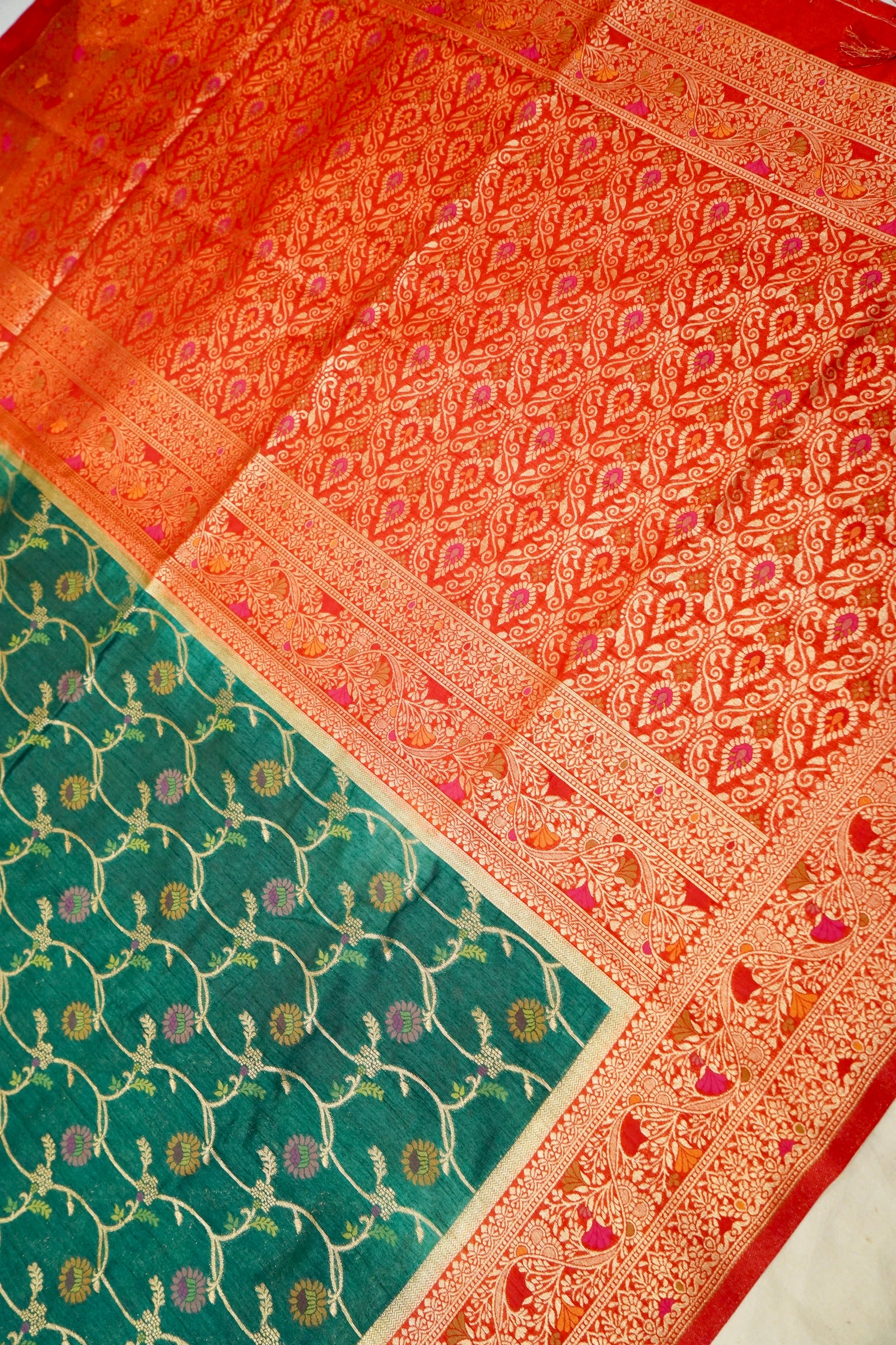 Bottle Green Dupion Patola Saree with Rust-Red Border & Intricate Gold Zari Work