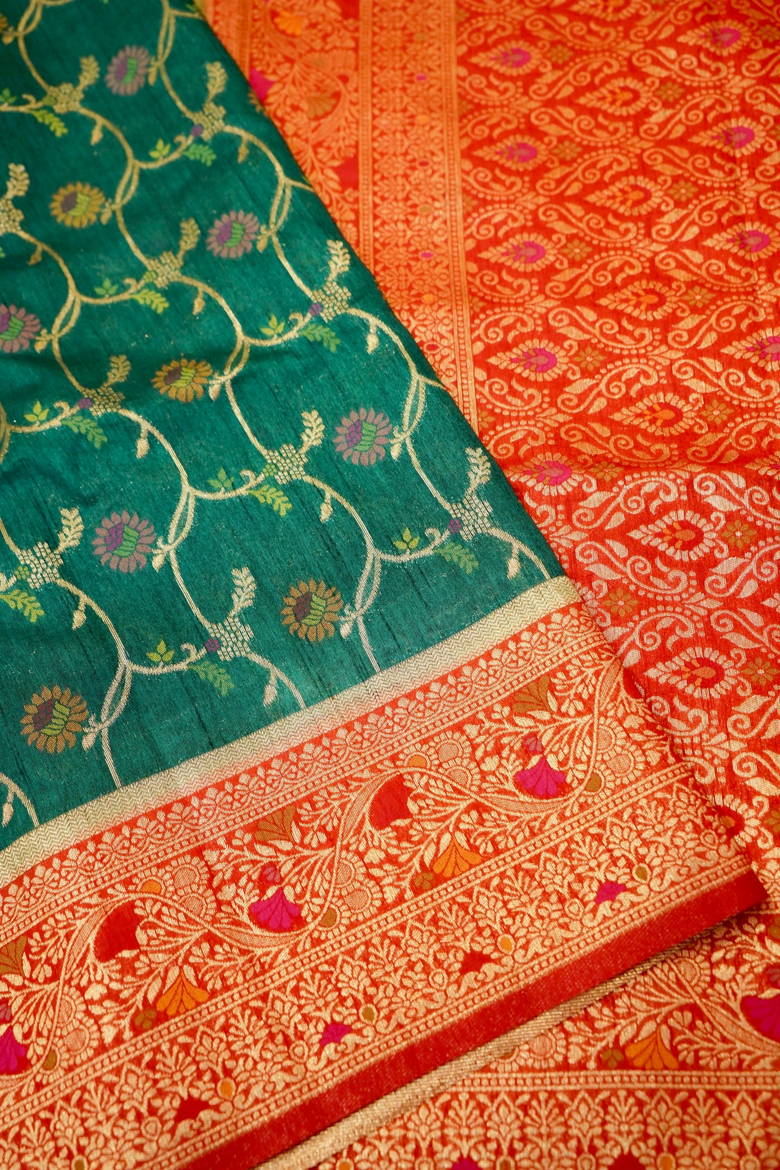 Bottle Green Dupion Patola Saree with Rust-Red Border & Intricate Gold Zari Work