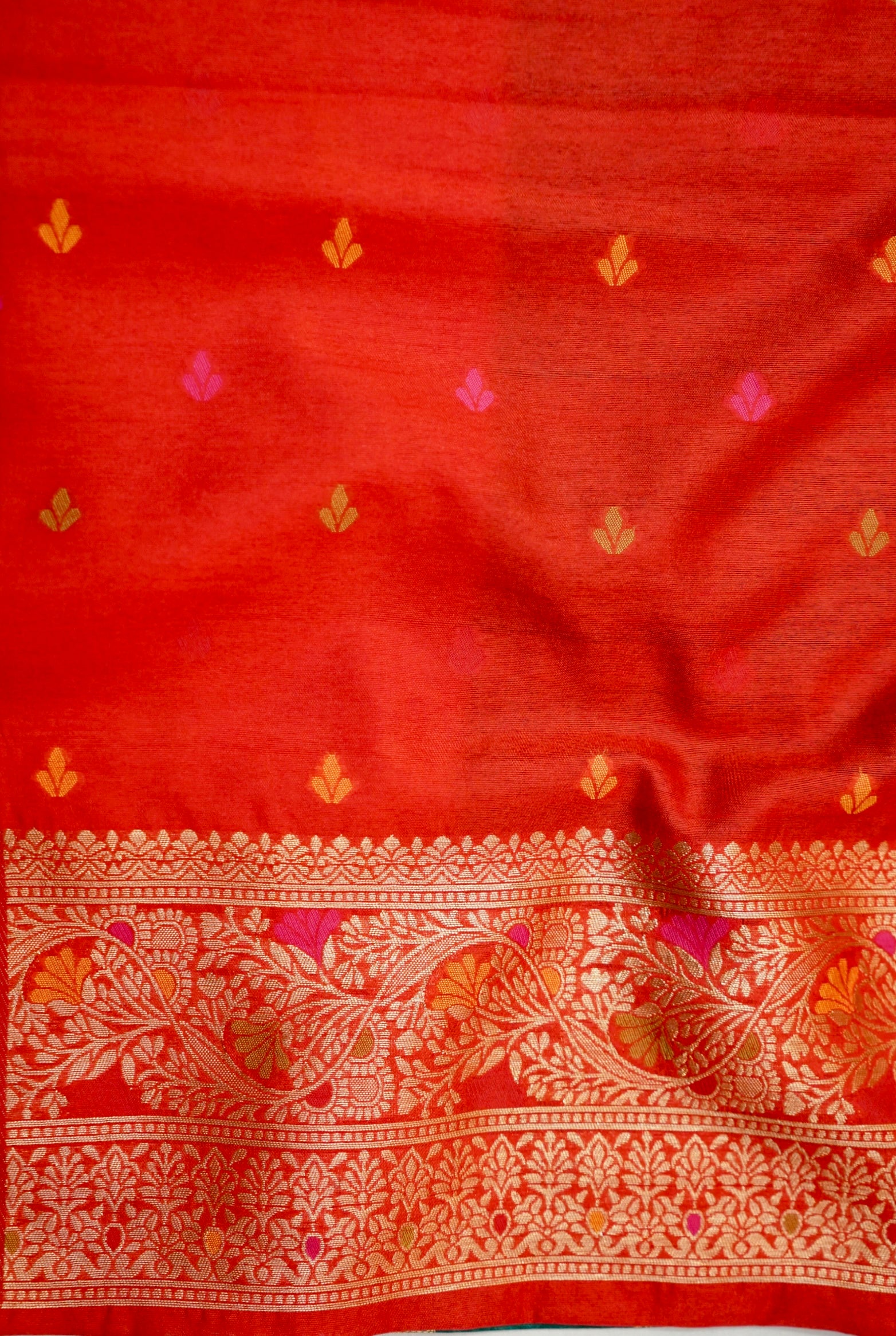 Bottle Green Dupion Patola Saree with Rust-Red Border & Intricate Gold Zari Work