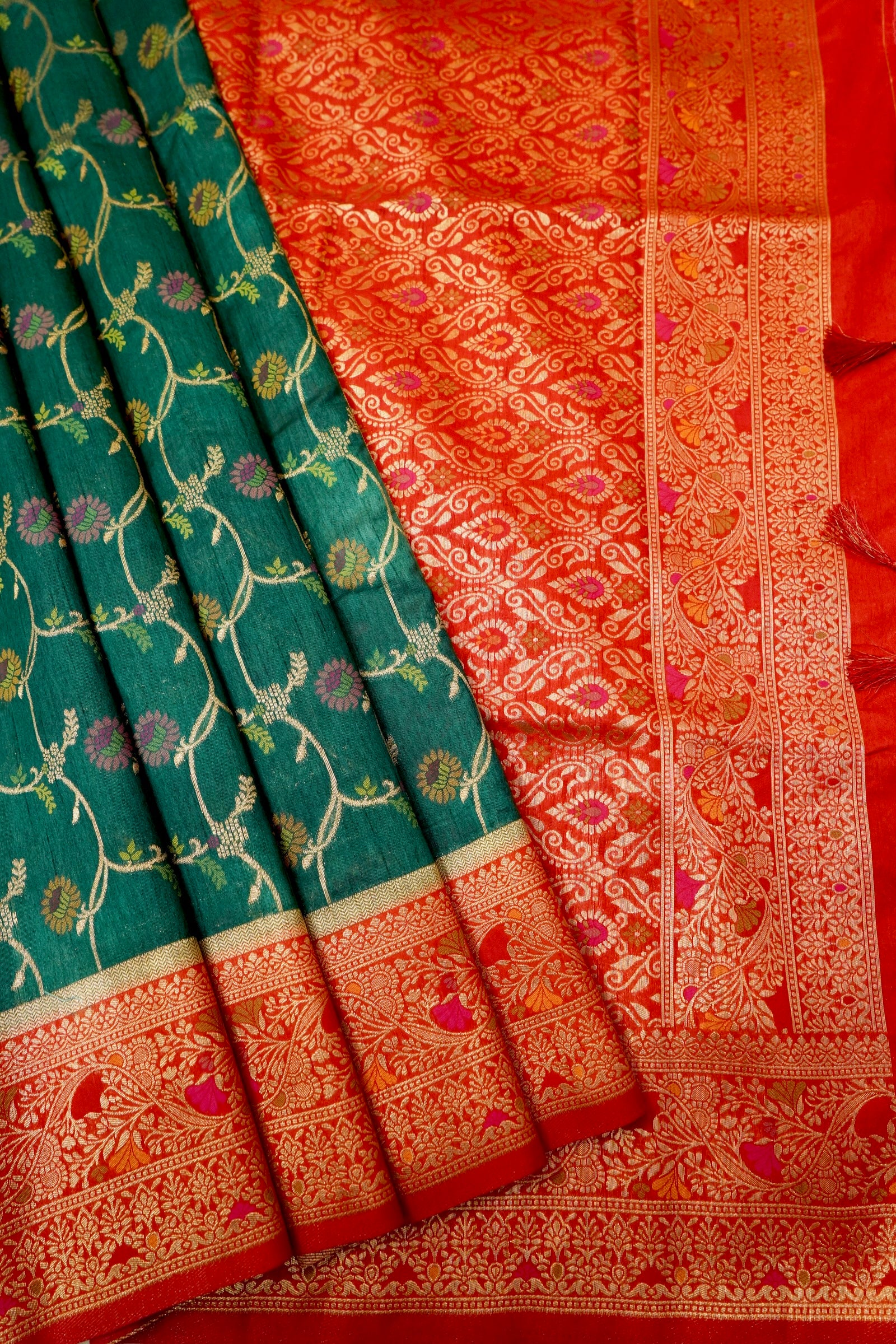 Bottle Green Dupion Patola Saree with Rust-Red Border & Intricate Gold Zari Work