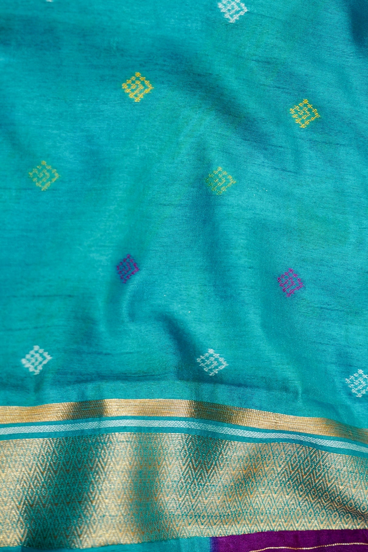 Purple Dupion Patola Saree with Teal Border & Traditional Motif Weave