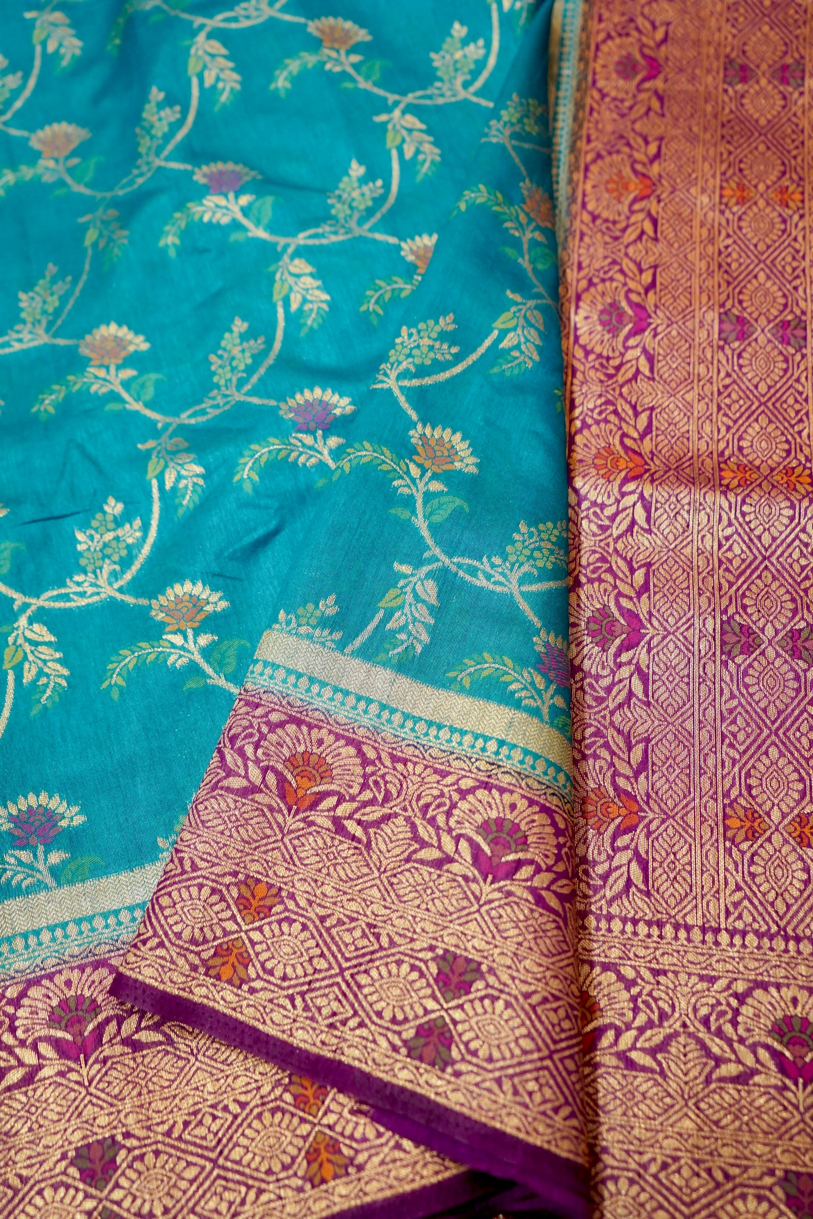Turquoise Blue Dupion Patola Saree with Antique Gold Zari Floral Weave