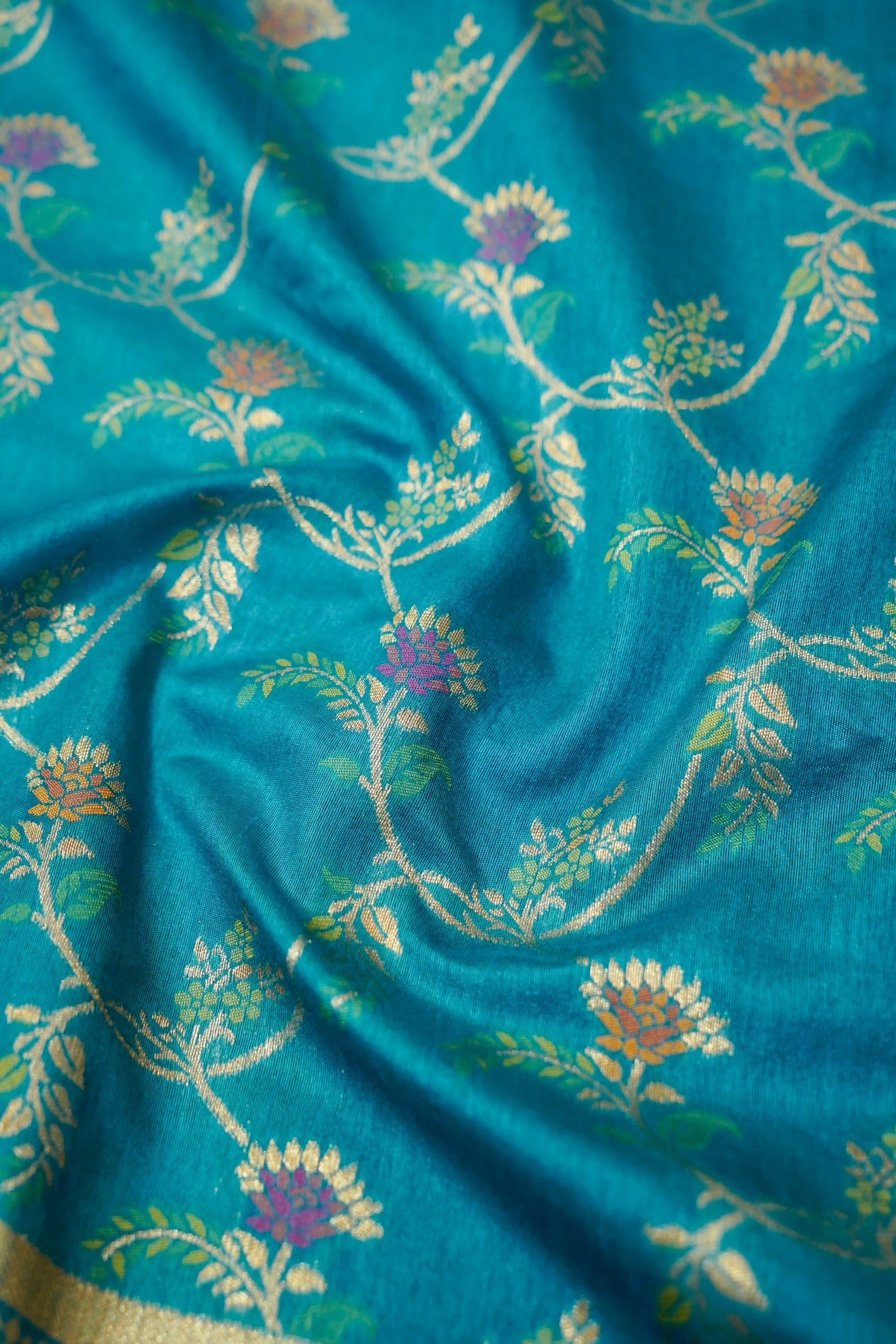 Turquoise Blue Dupion Patola Saree with Antique Gold Zari Floral Weave
