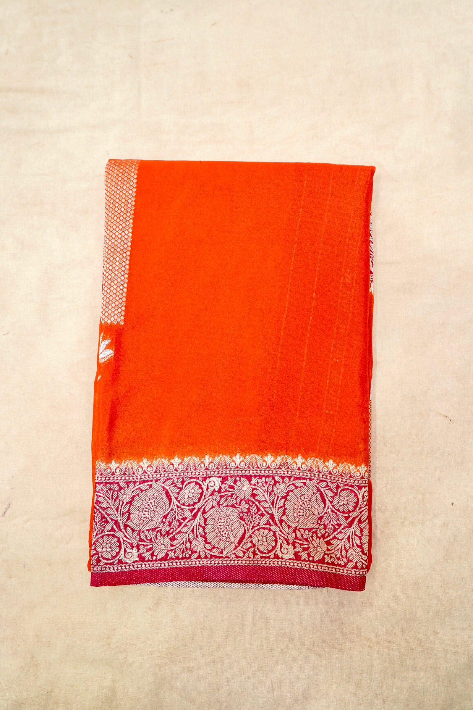 Orange Pure Crepe Silk Saree with Red and Gold Zari Border