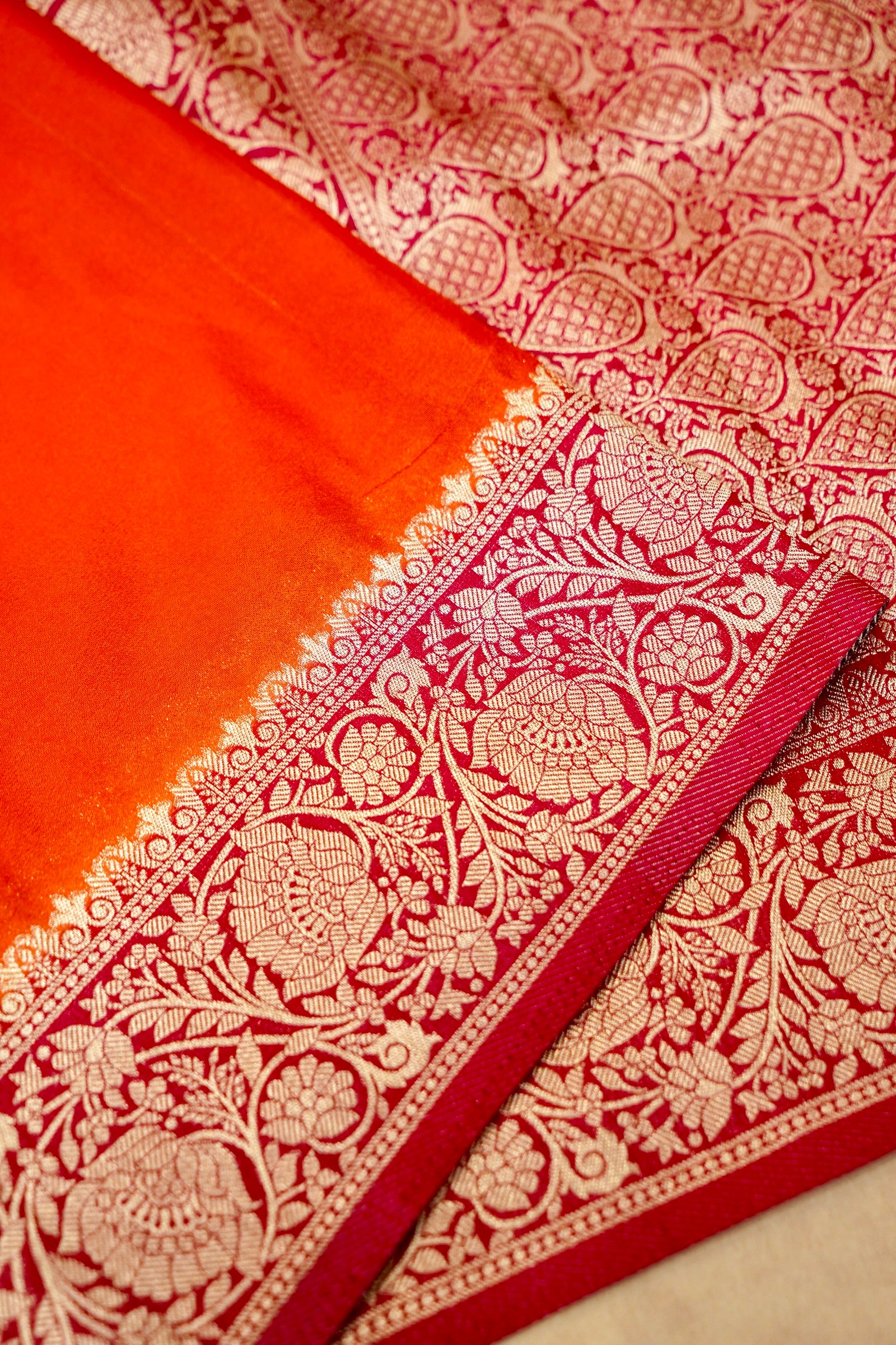 Orange Pure Crepe Silk Saree with Red and Gold Zari Border
