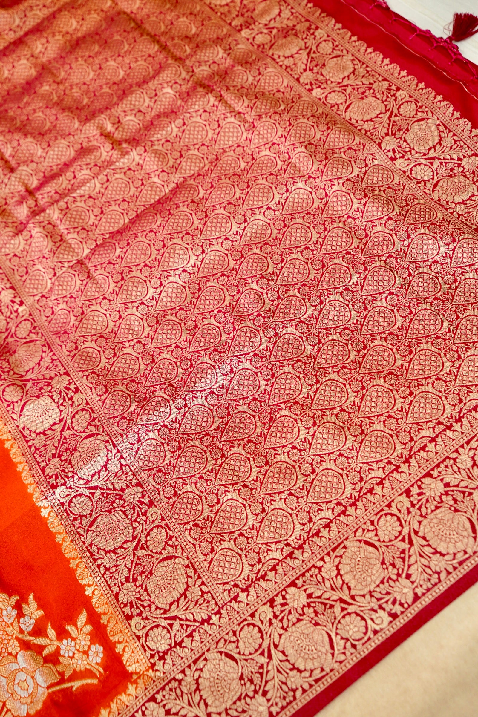 Orange Pure Crepe Silk Saree with Red and Gold Zari Border