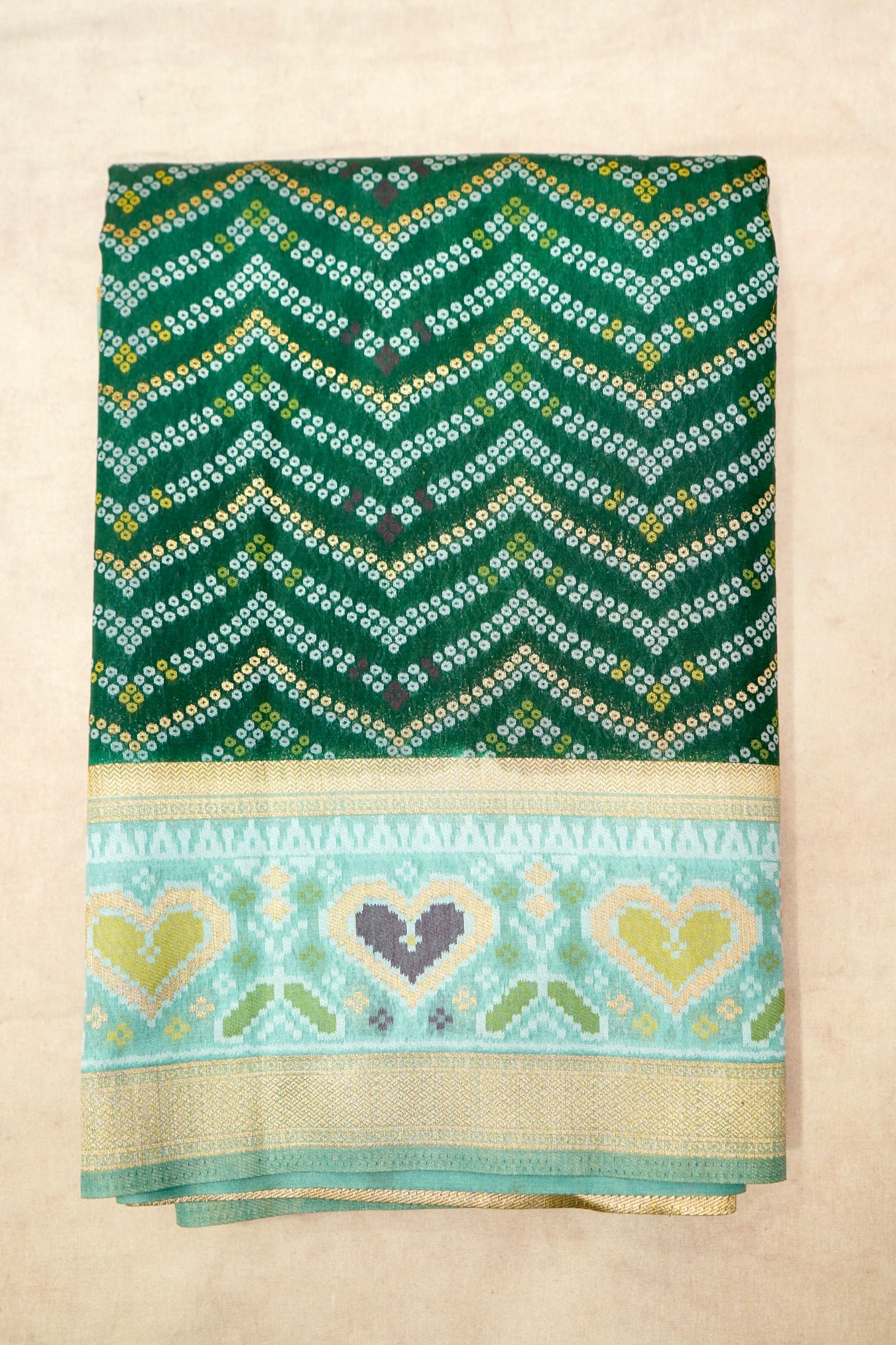 Bottle Green Ikkat Patola Silk Saree with Mint Green Border