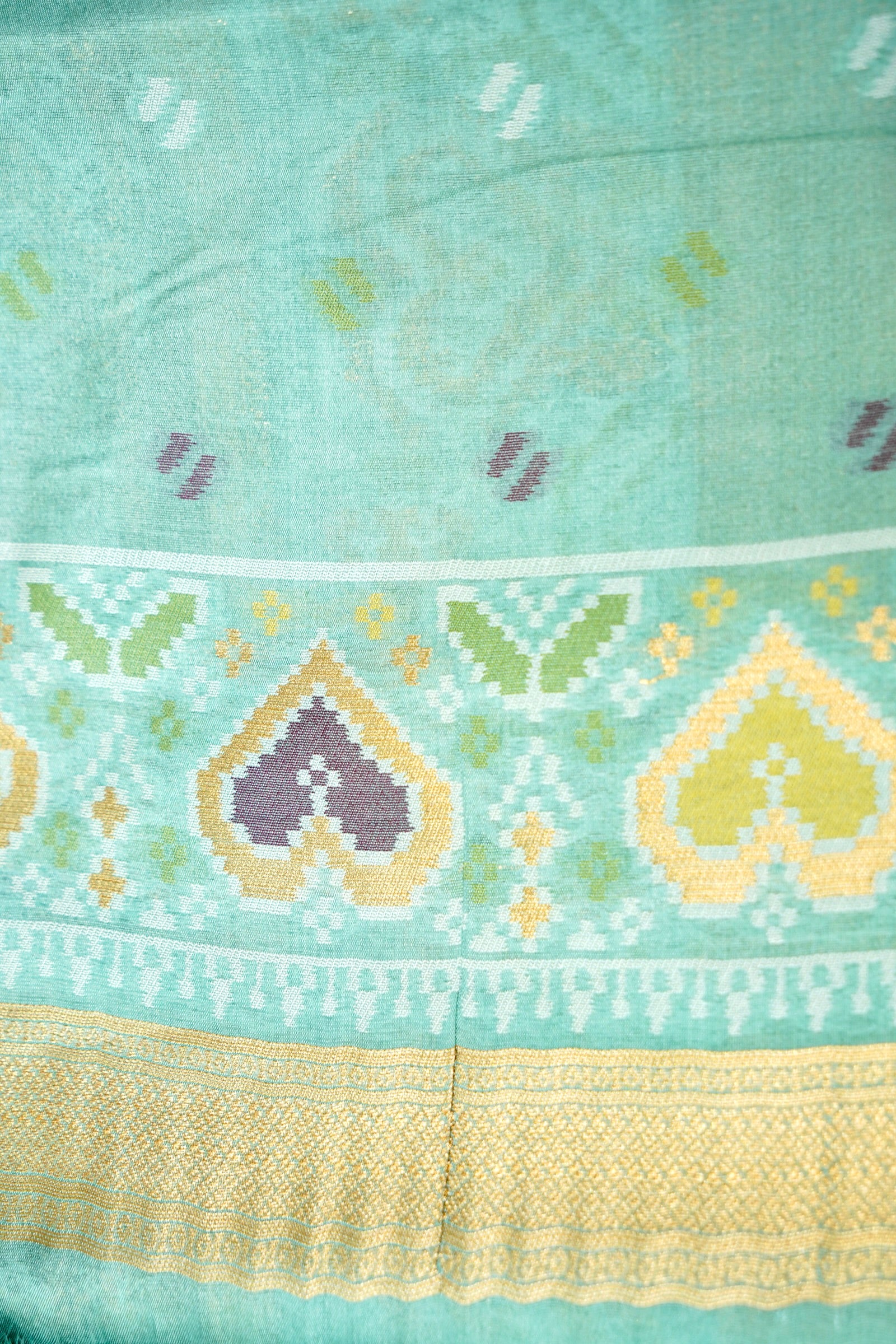 Bottle Green Ikkat Patola Silk Saree with Mint Green Border