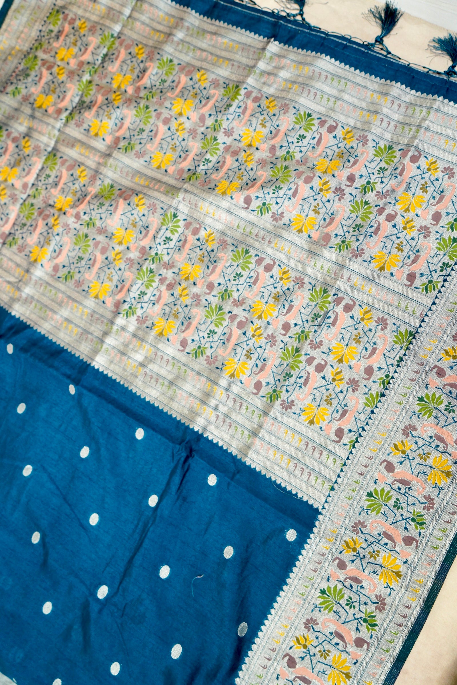 Teal Blue Raw Silk Saree with Light Gold Zari and Multicolor Floral Border