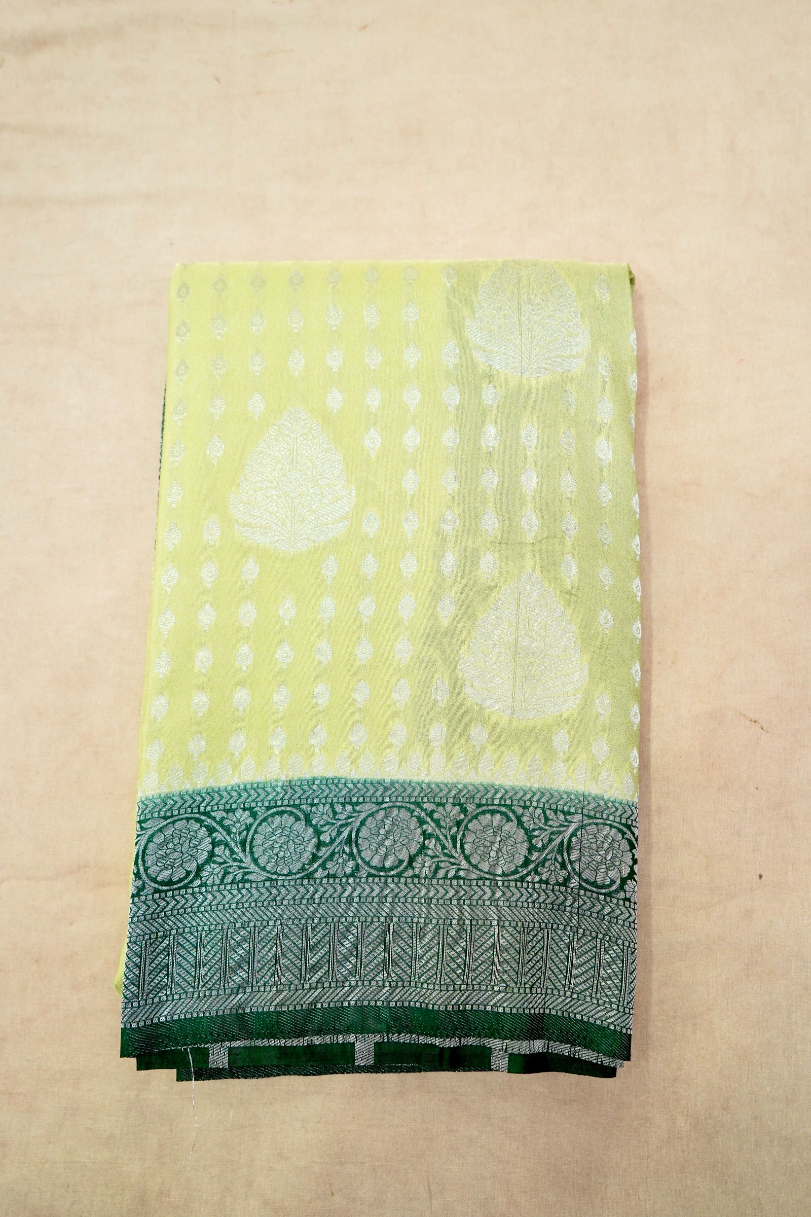 Pistachio Green Crepe Georgette Silk Saree with Dark Green Border