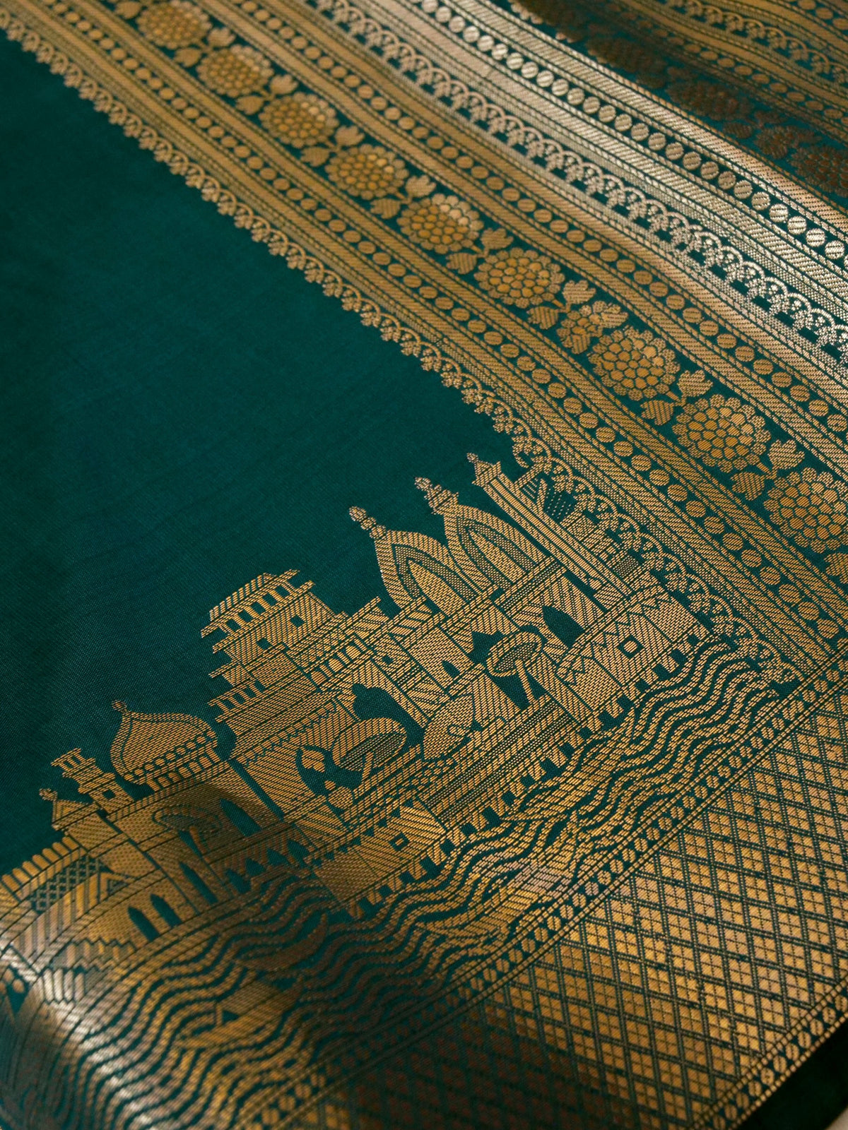 Vihar - Deep Teal Green Ghat Border Banarasi Silk Saree with Stitched Blouse