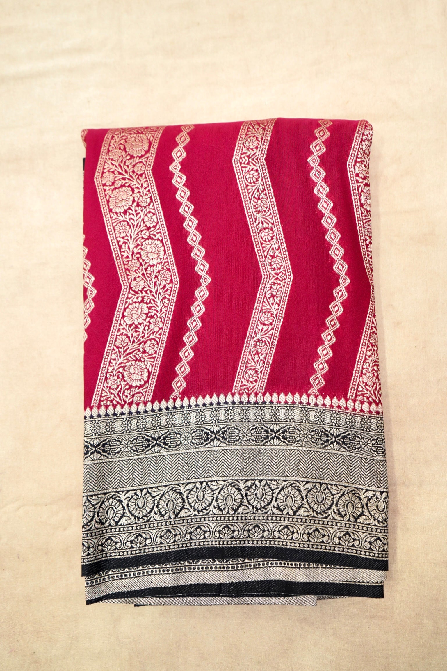 Crimson Red Crepe Georgette Silk Saree with Black and Gold Border