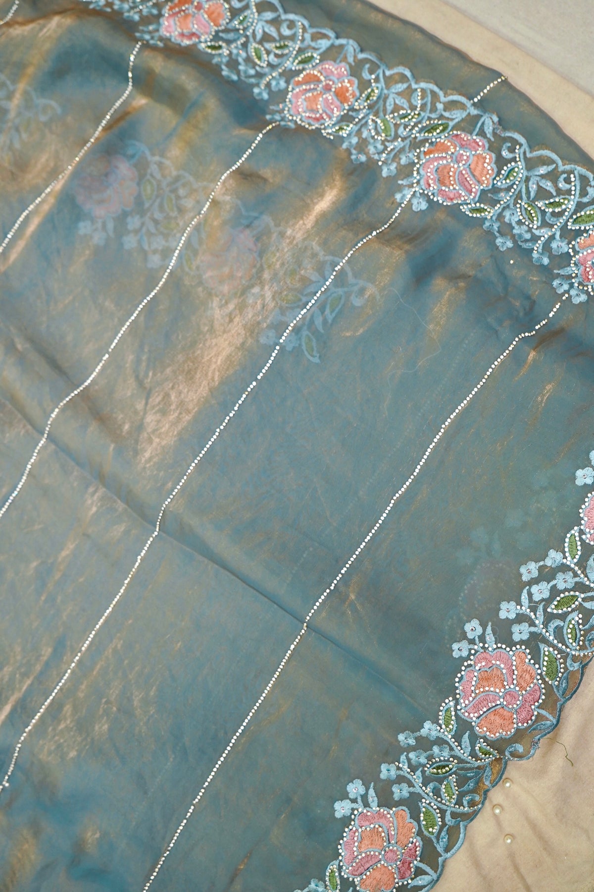 Sea Green Camellia Bloom Designer Tissue Saree with Rhinestone
