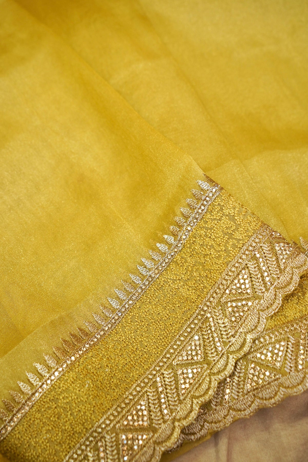 Rhinestone Border Designer Tissue Saree in Golden Mustard
