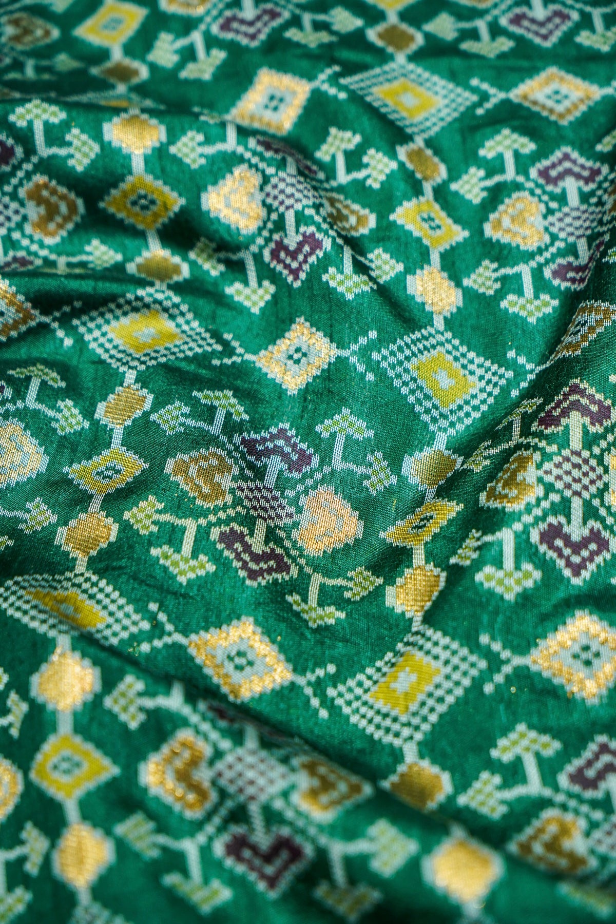 Bottle Green Ikkat Patola Silk Saree with Blush Pink Border