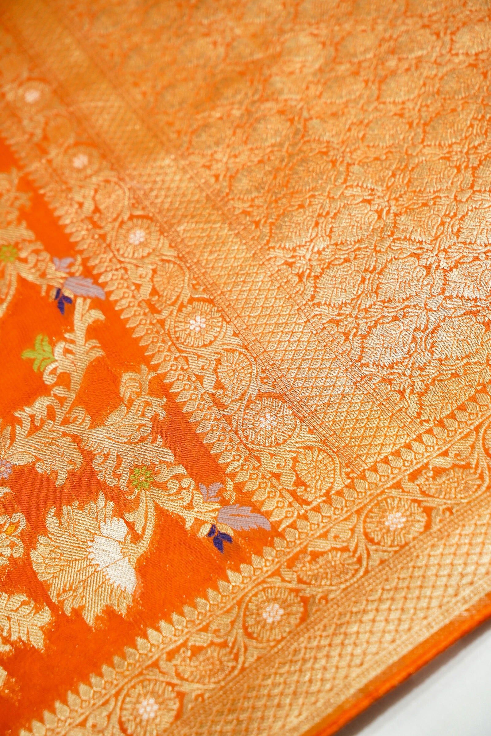 Tangerine Orange Semi Georgette Silk Saree with Gold Zari Border