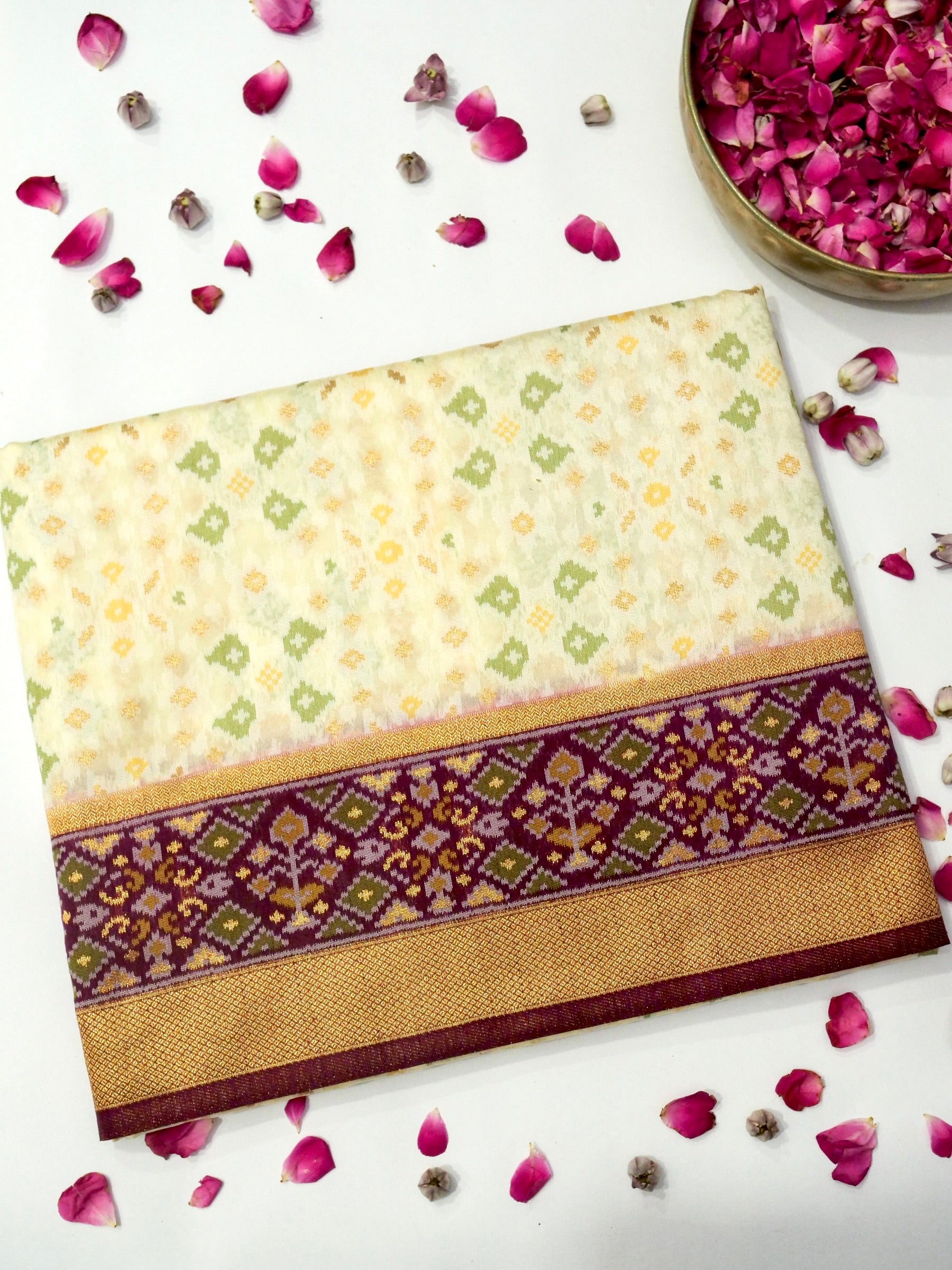 Soft Ivory Patola Silk Saree with Regal Plum Border
