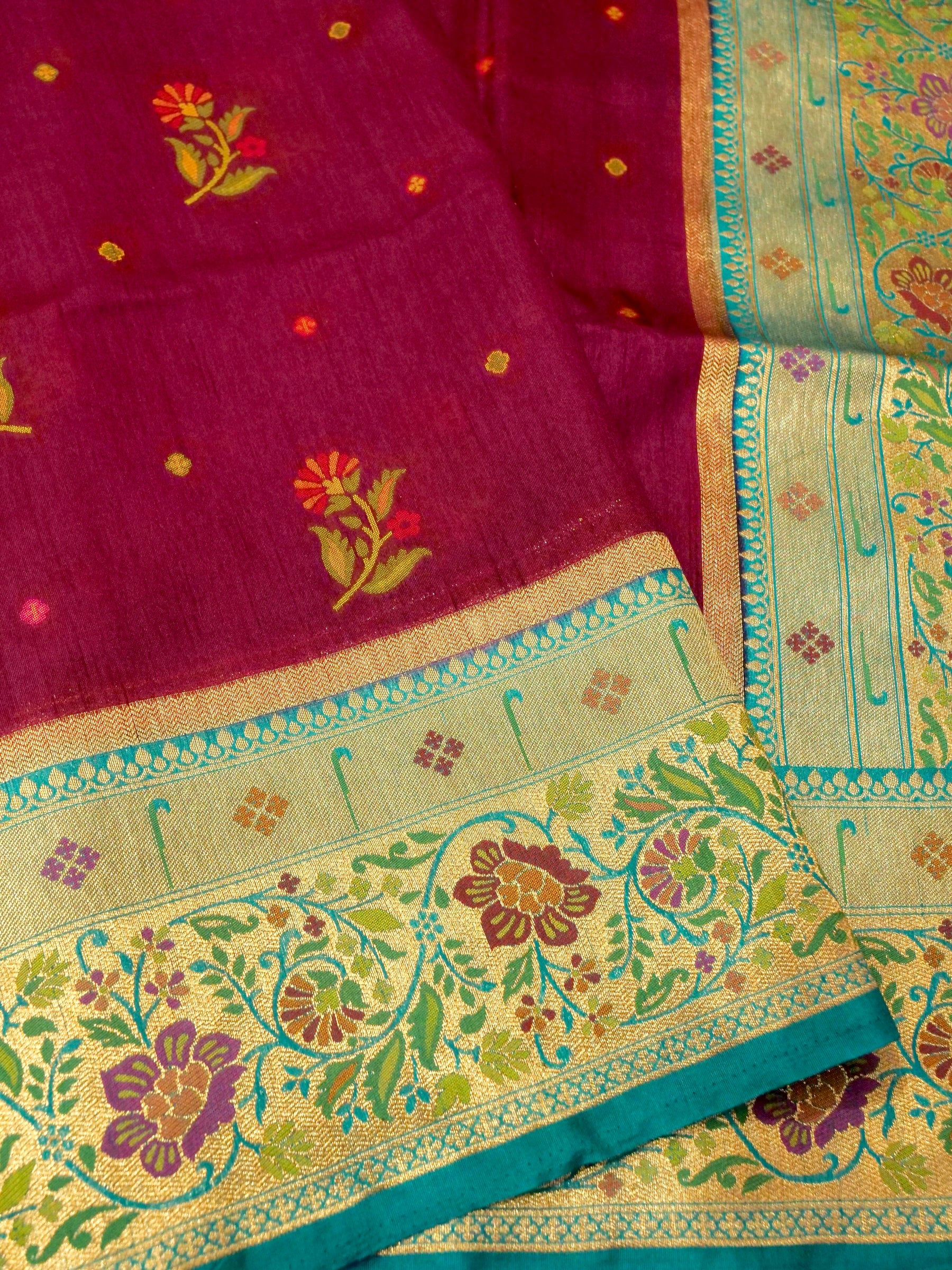 Wine Magenta Patola Silk Saree with Contrast Turquoise Border and Floral Weave