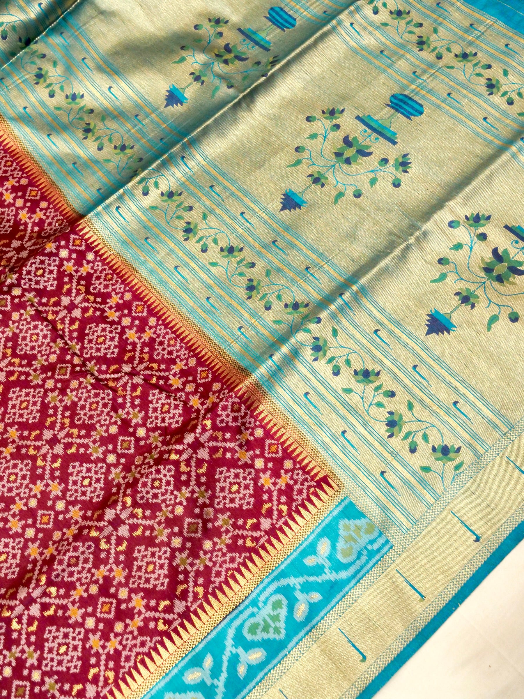 Maroon Wine Patola Silk Saree with Contrast Turquoise Blue Border