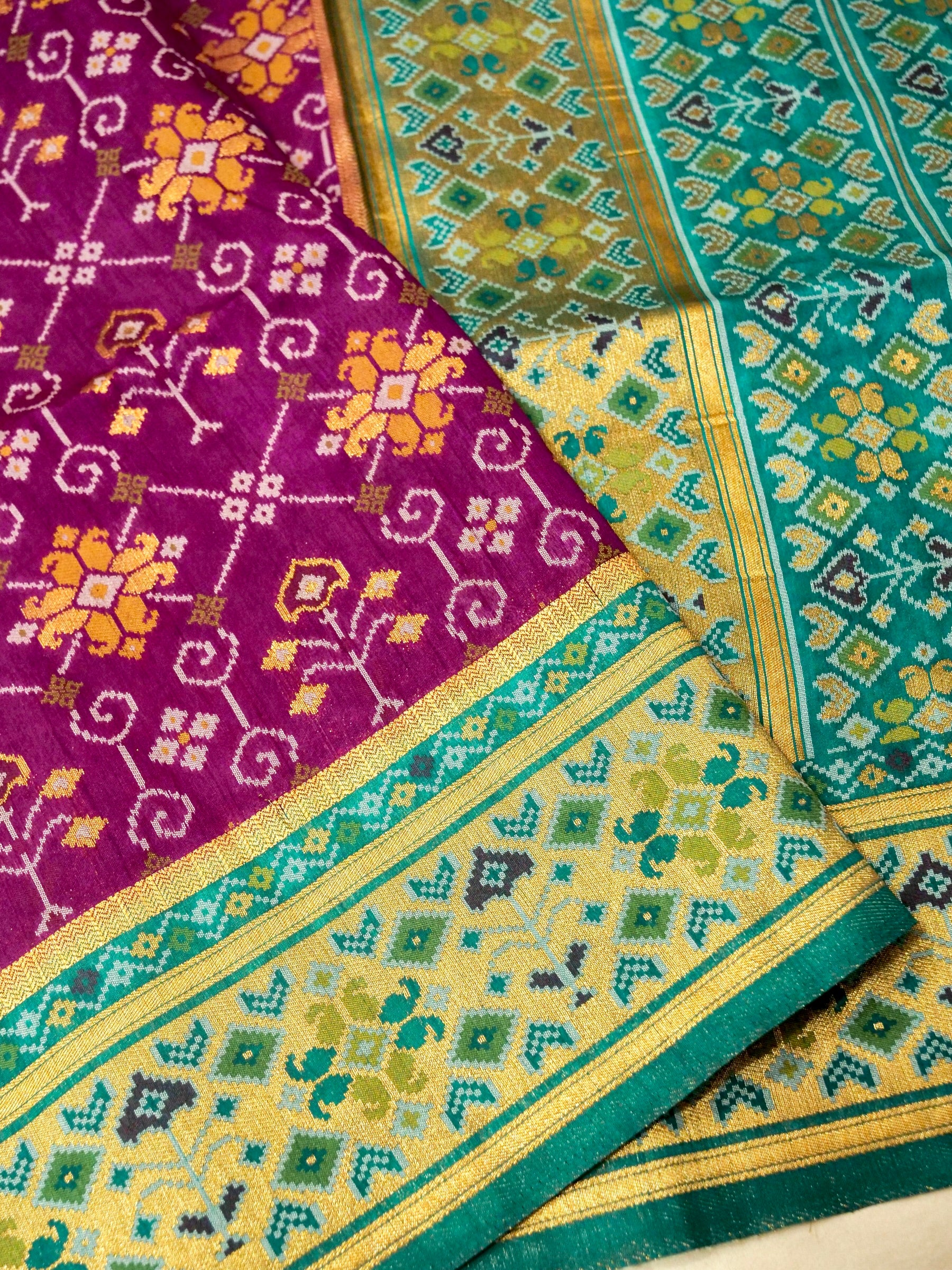 Magenta Purple Patola Silk Saree with Contrast Teal Green Border