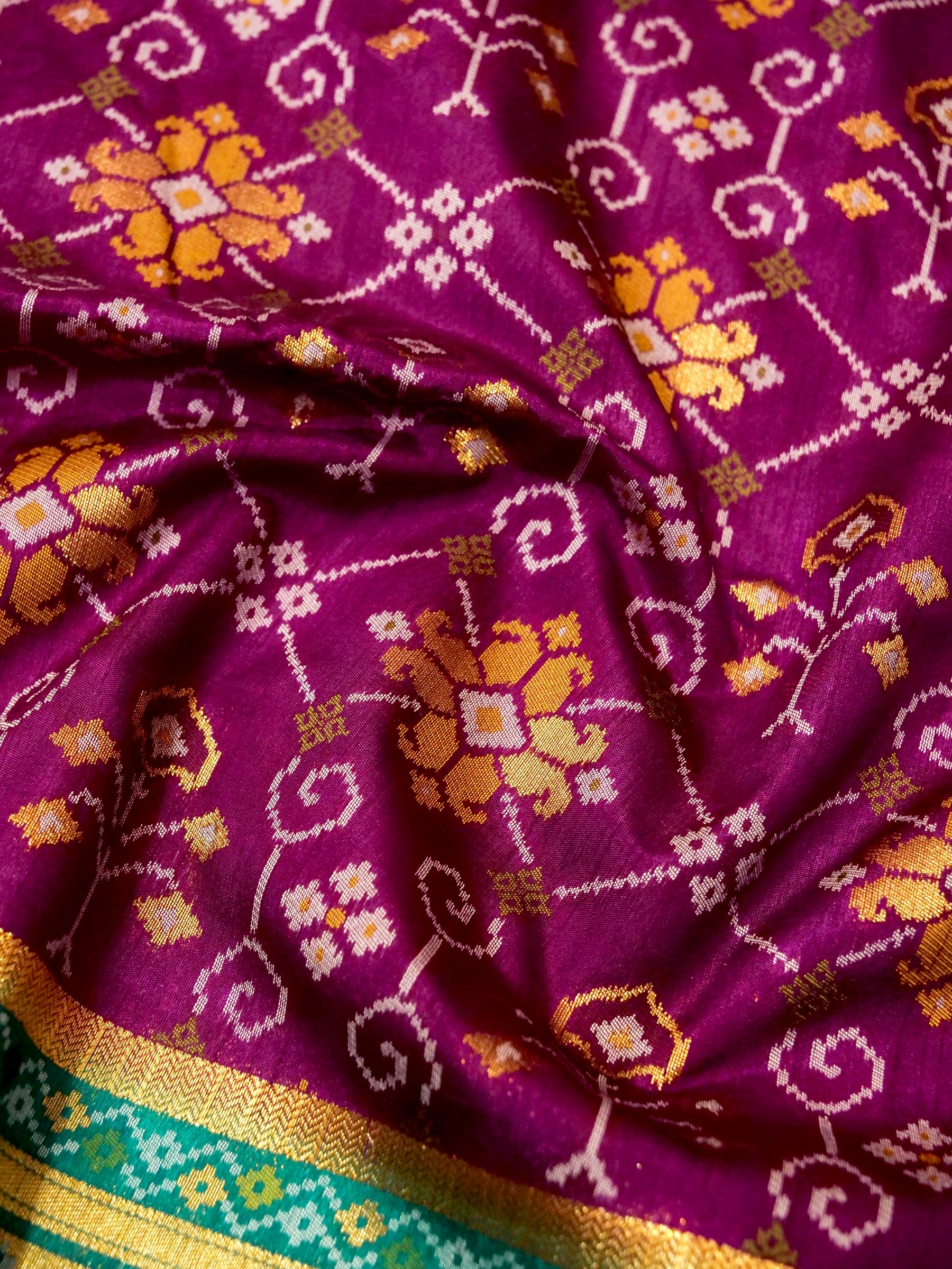 Magenta Purple Patola Silk Saree with Contrast Teal Green Border