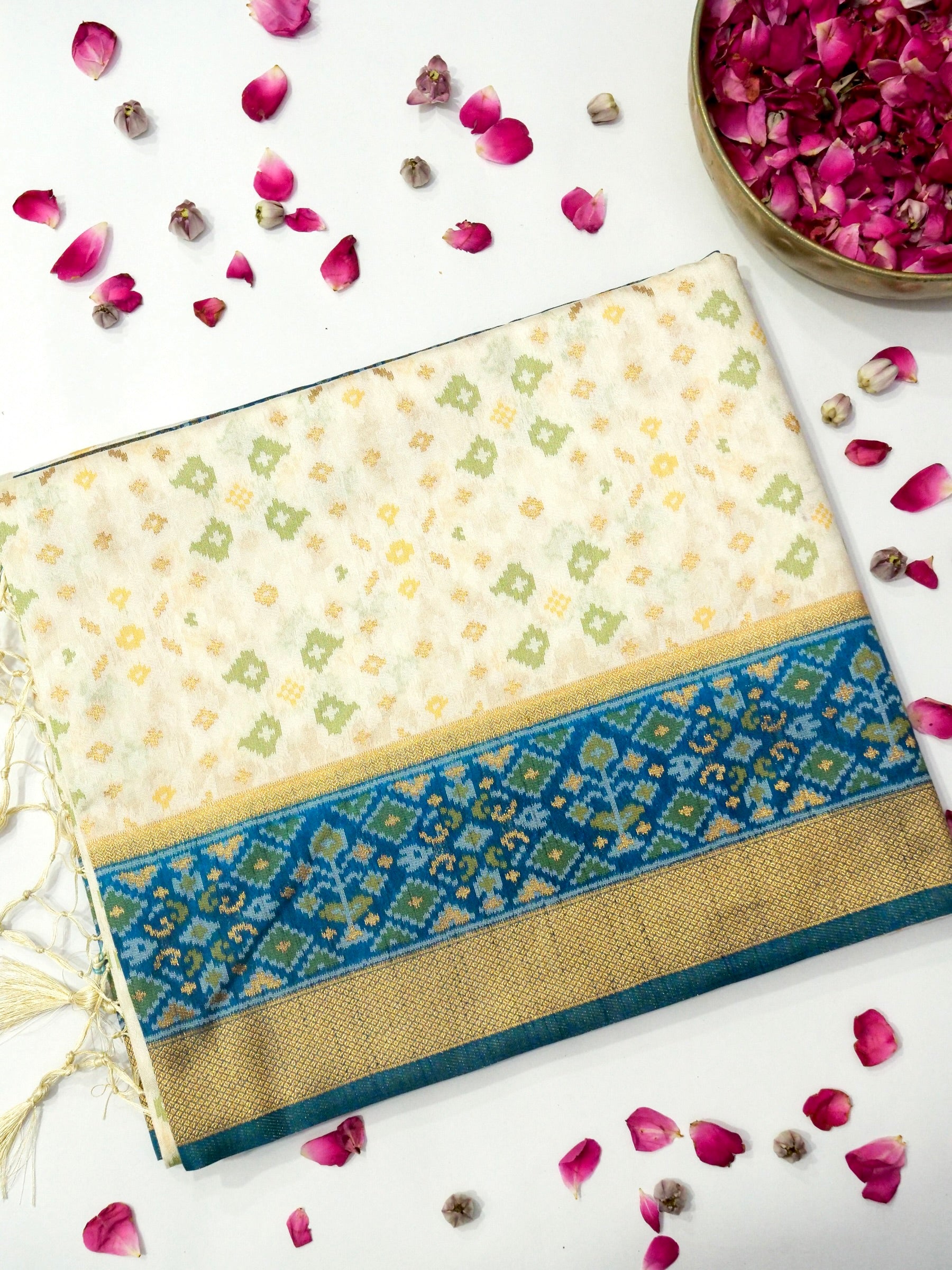 Soft Ivory Patola Silk Saree with Peacock Blue Border