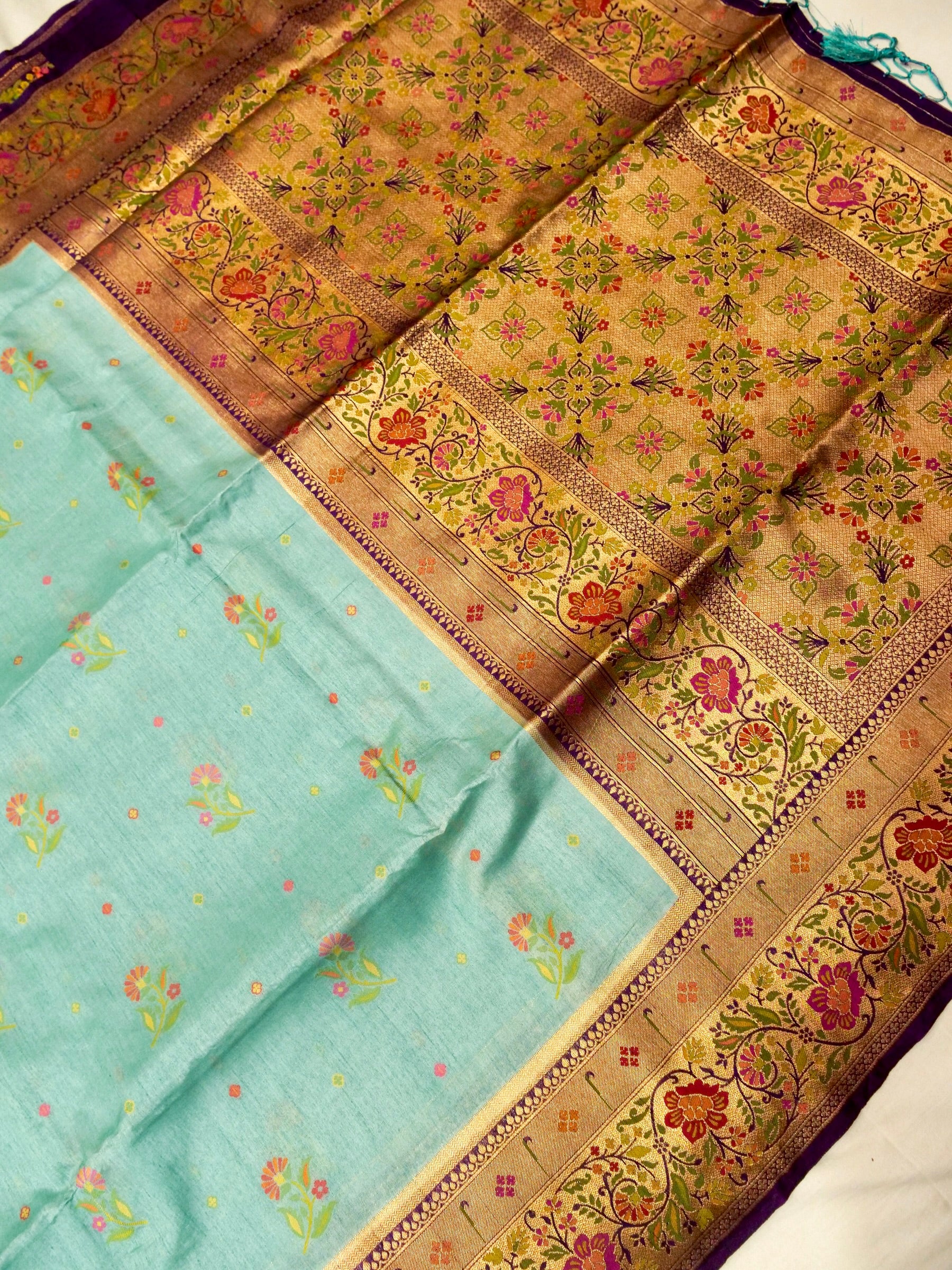 Mint Aqua Patola Silk Saree with Contrast Purple Floral Zari Border
