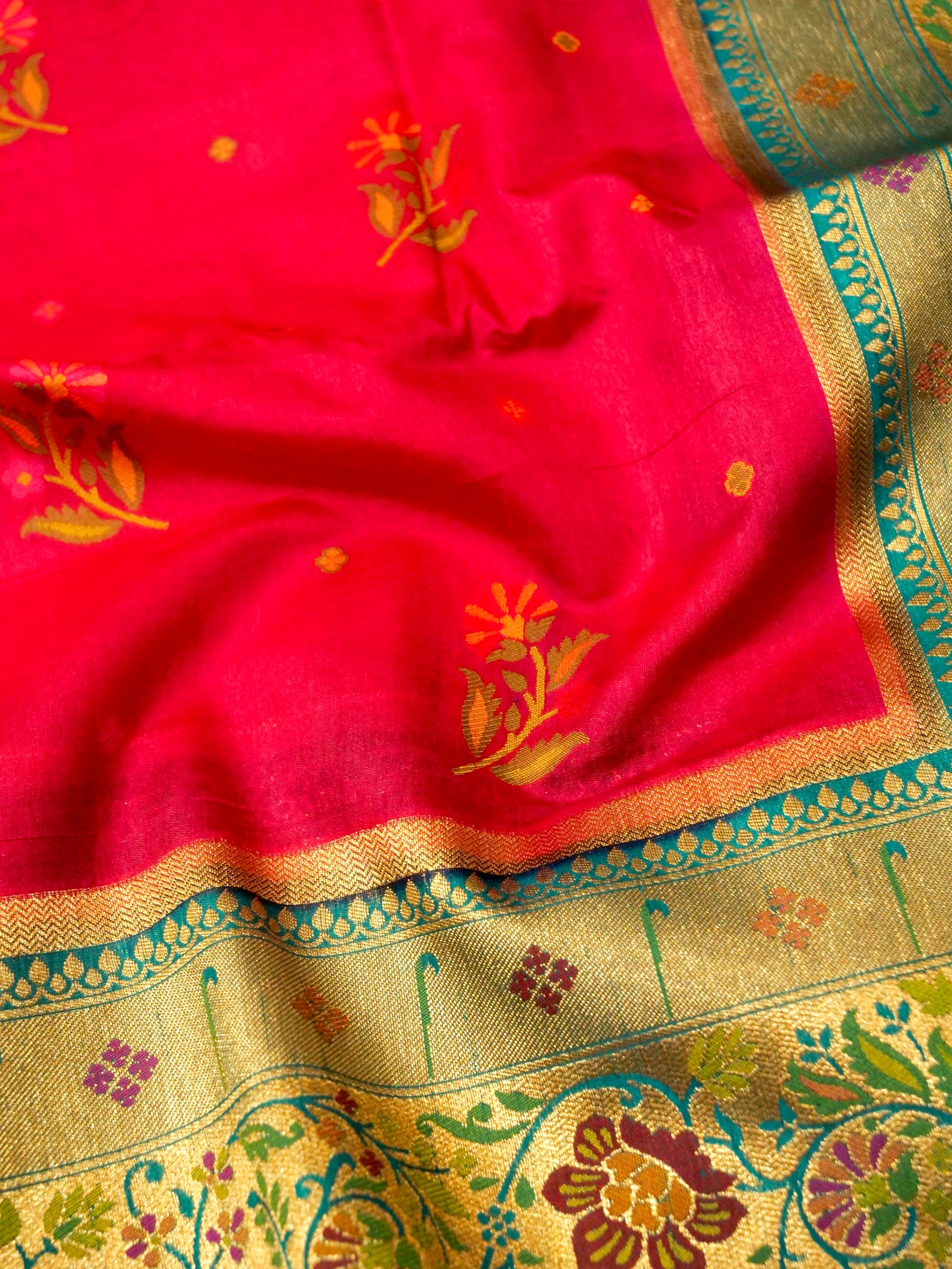 Rani Pink Patola Silk Saree with Contrast Teal Floral Zari Border