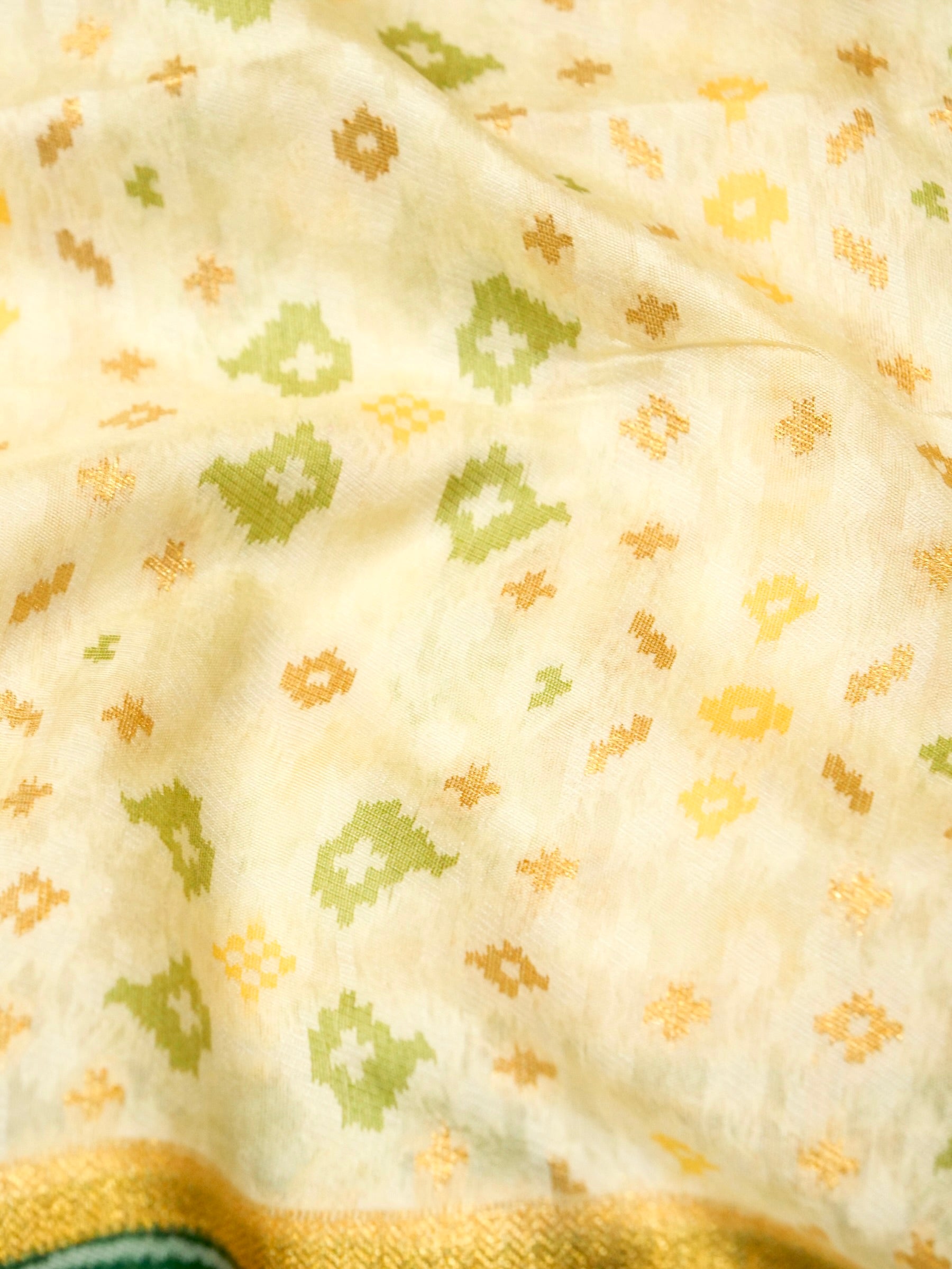 Soft Ivory Patola Silk Saree with Emerald Green Border