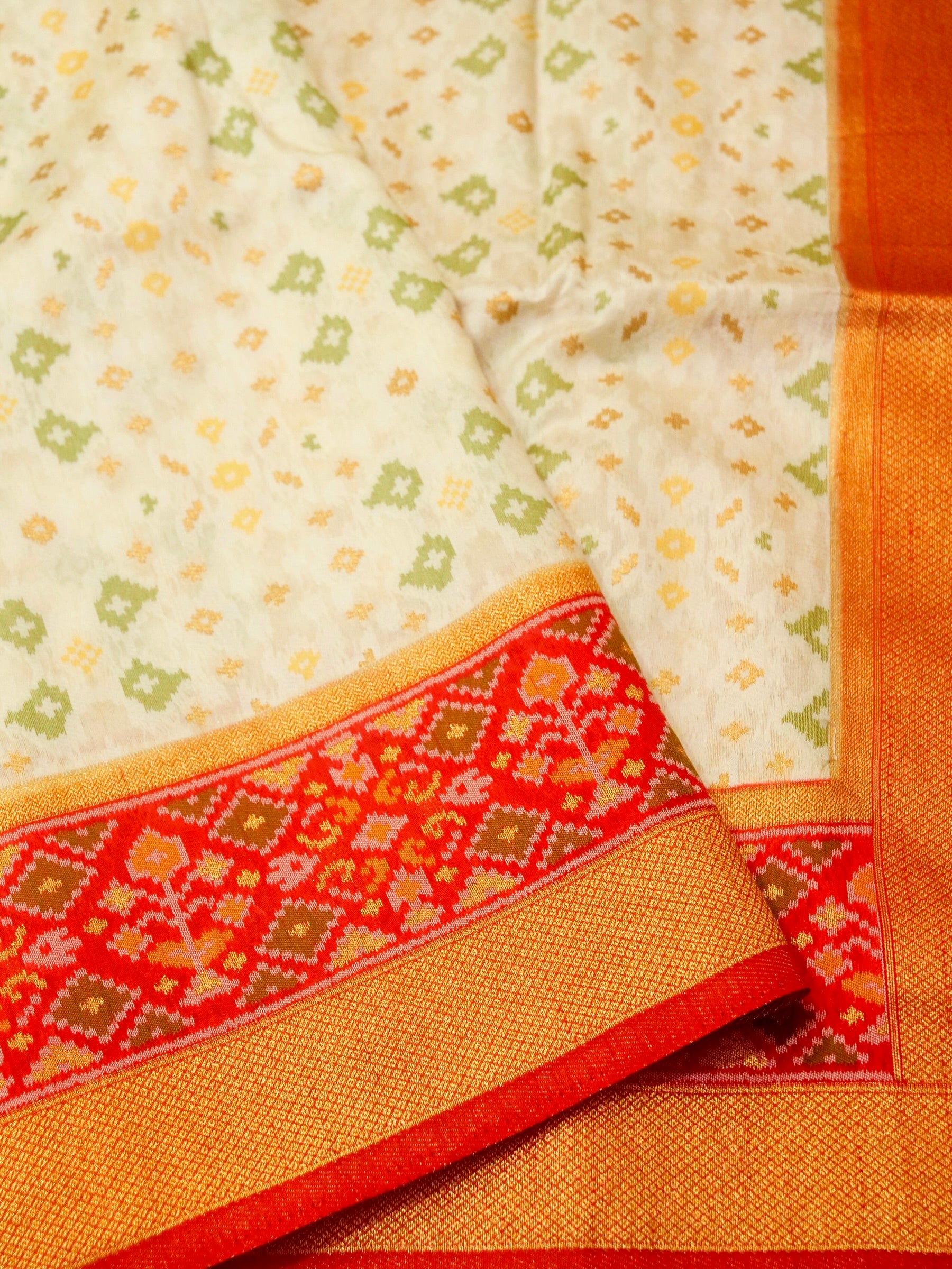 Soft Ivory Patola Silk Saree with Coral Red Border