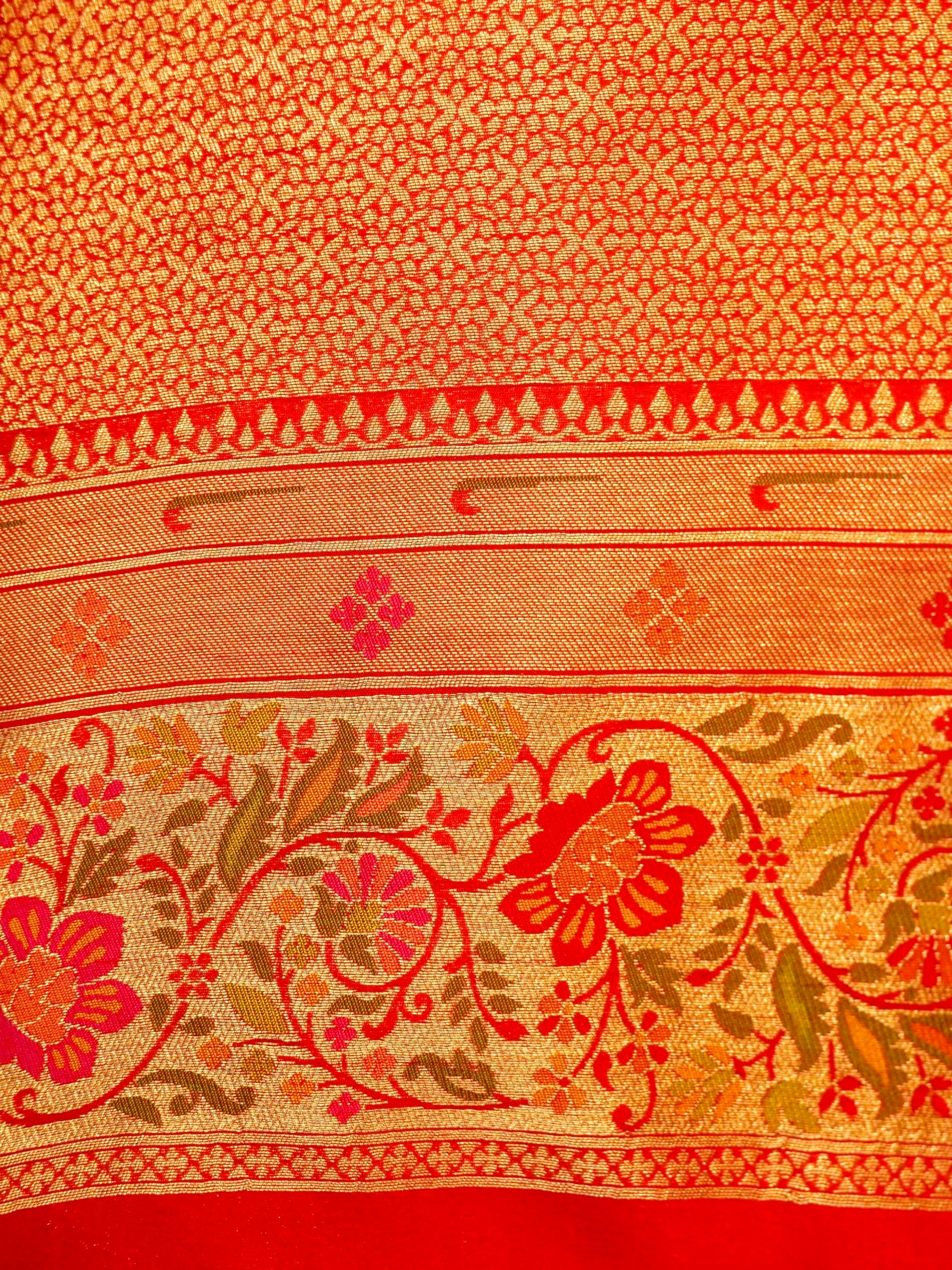 Bottle Green Patola Silk Saree with Contrast Coral Floral Zari Border