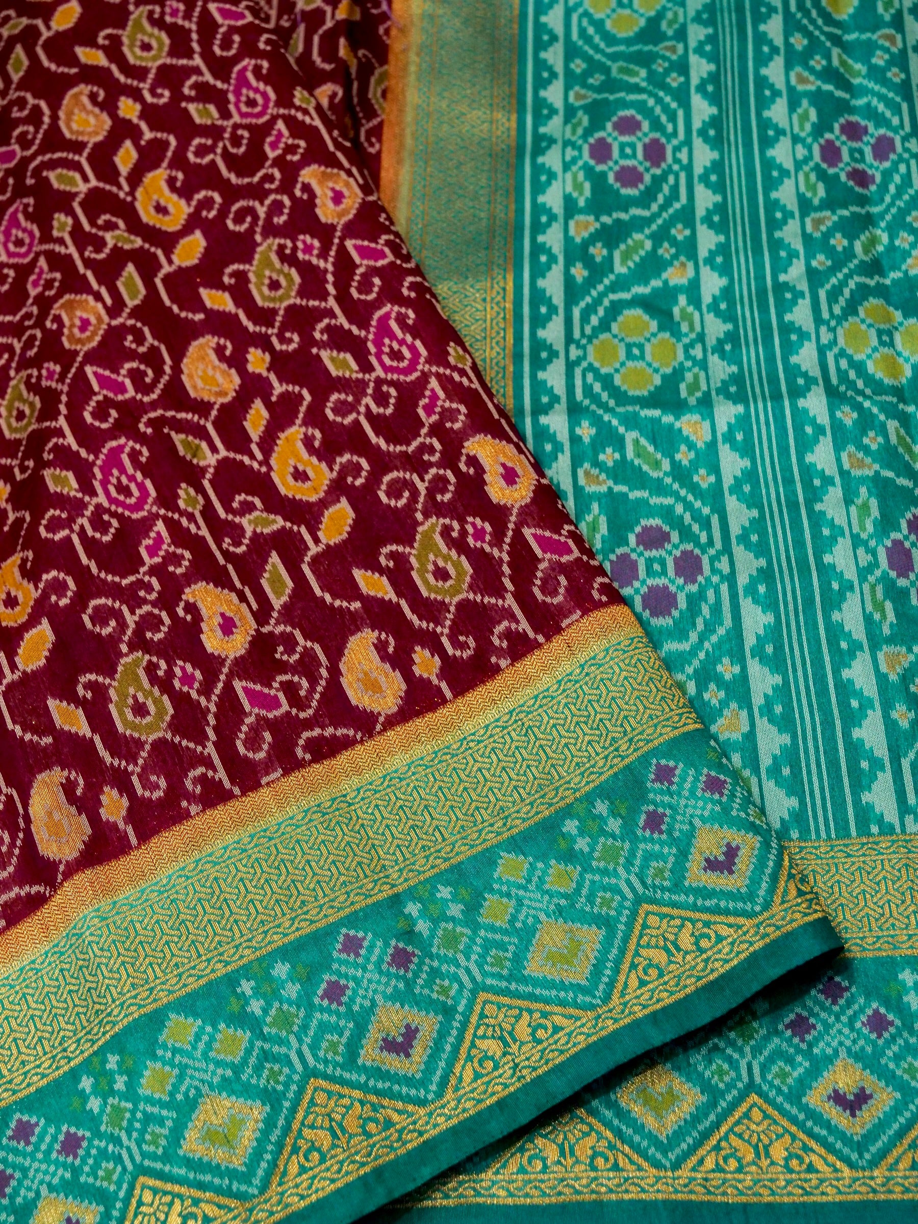 Wine Patola Silk Saree with Contrast Turquoise Border