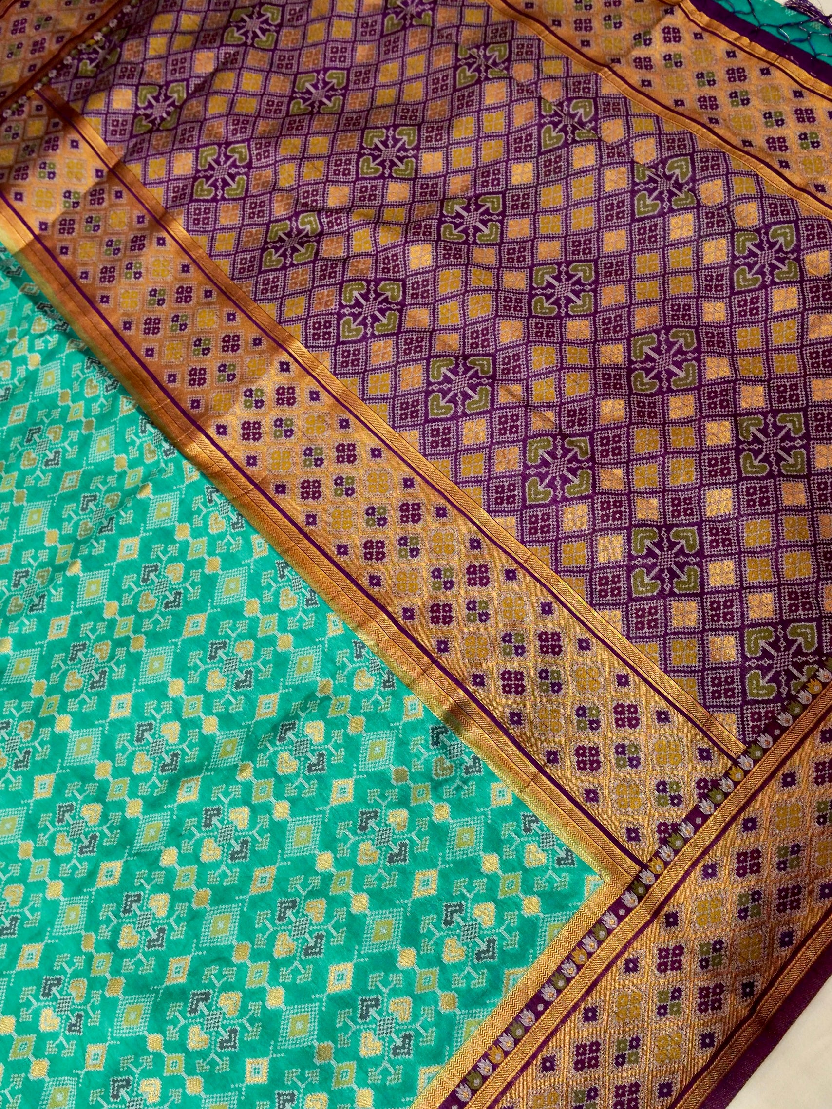 Turquoise Patola Silk Saree with Contrast Violet Border