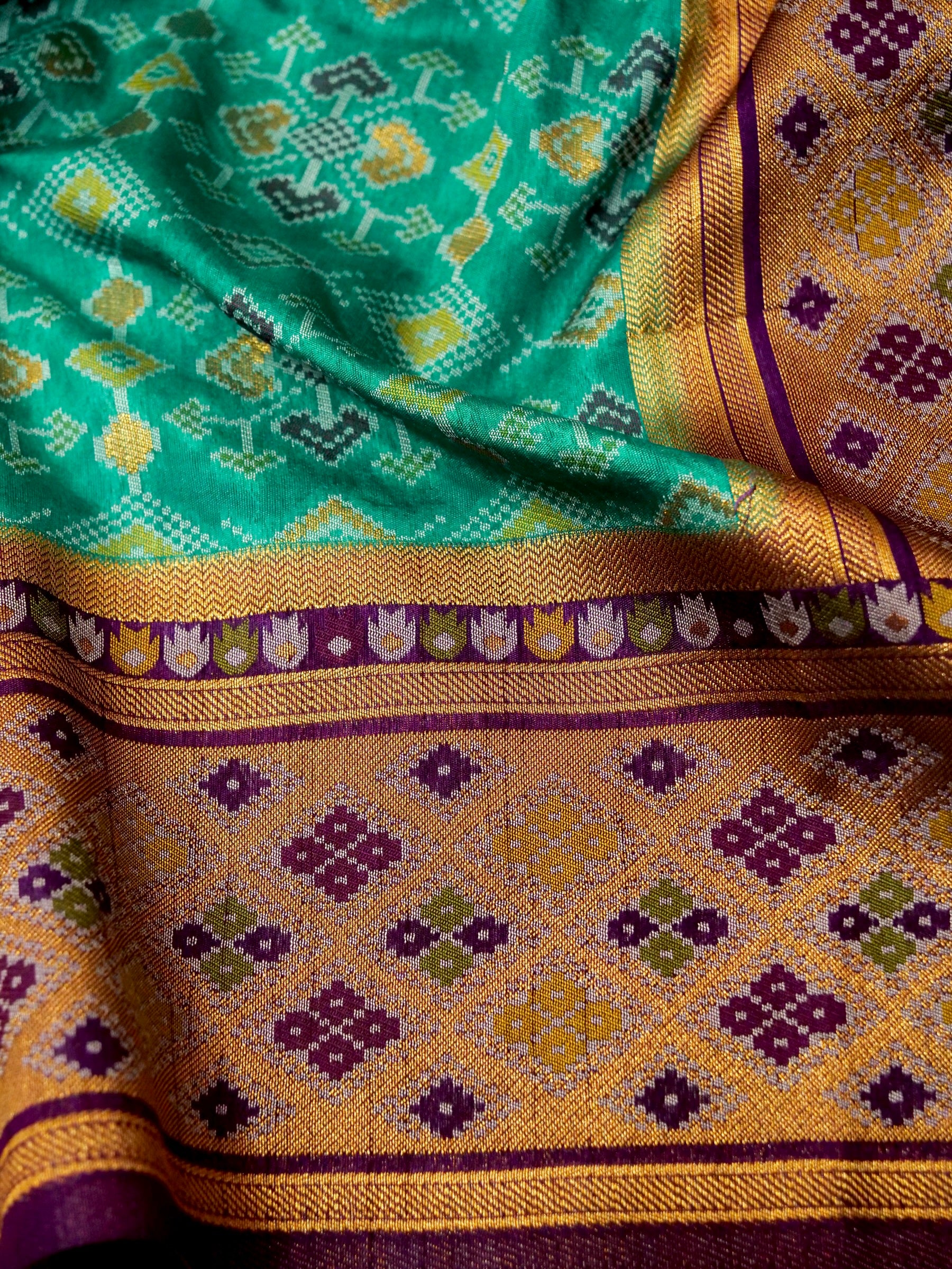 Turquoise Patola Silk Saree with Contrast Violet Border