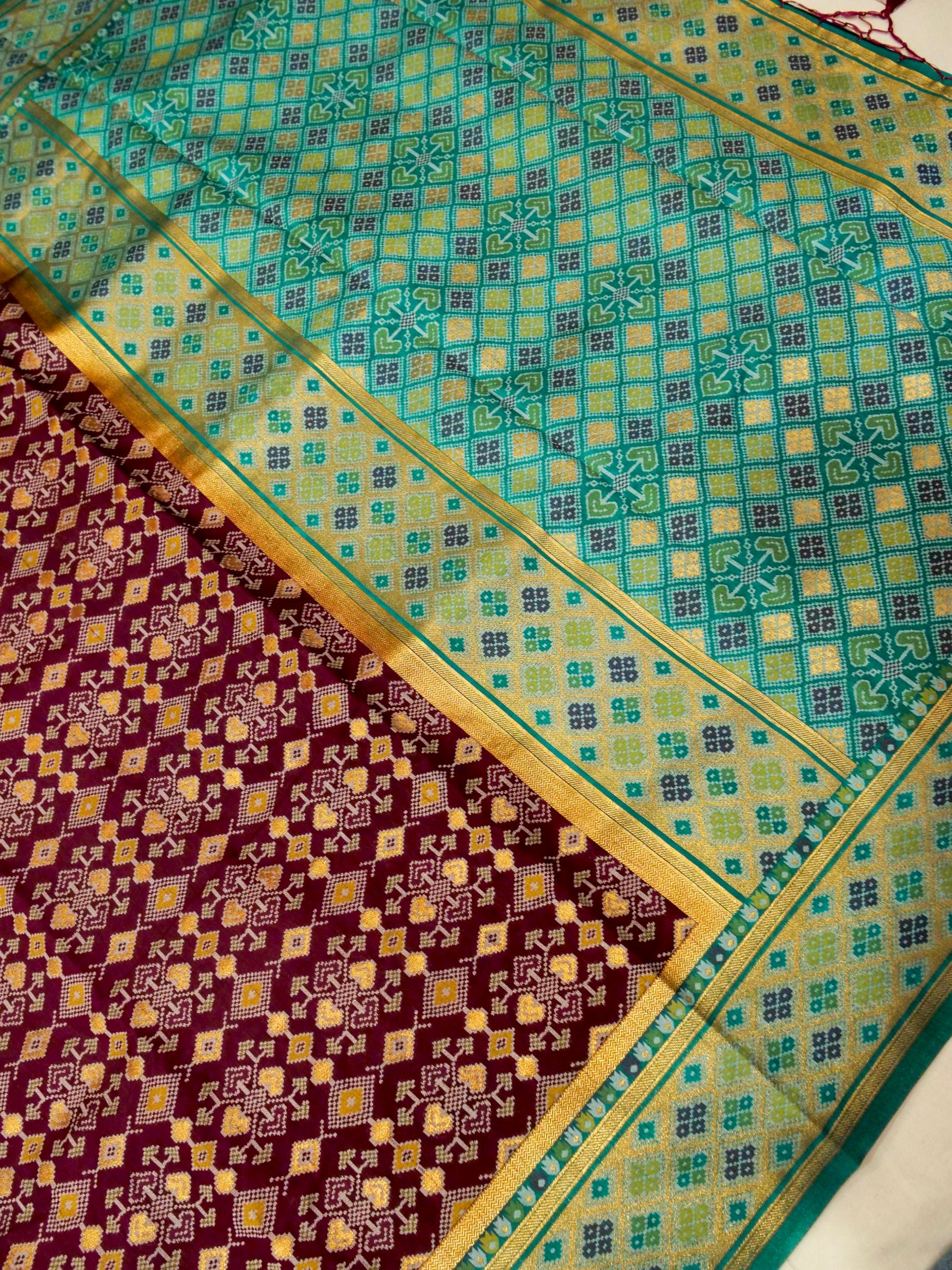 Burgundy Patola Silk Saree with Contrast Teal Border