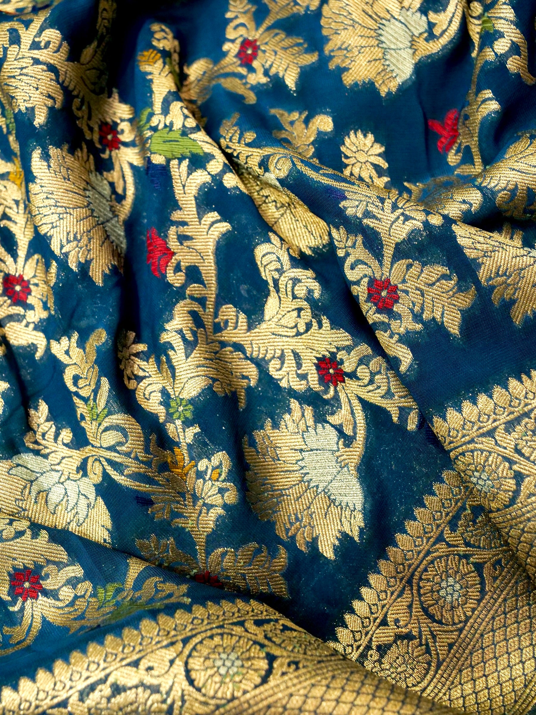 Peacock Blue Crepe Georgette Silk Saree with Gold Border