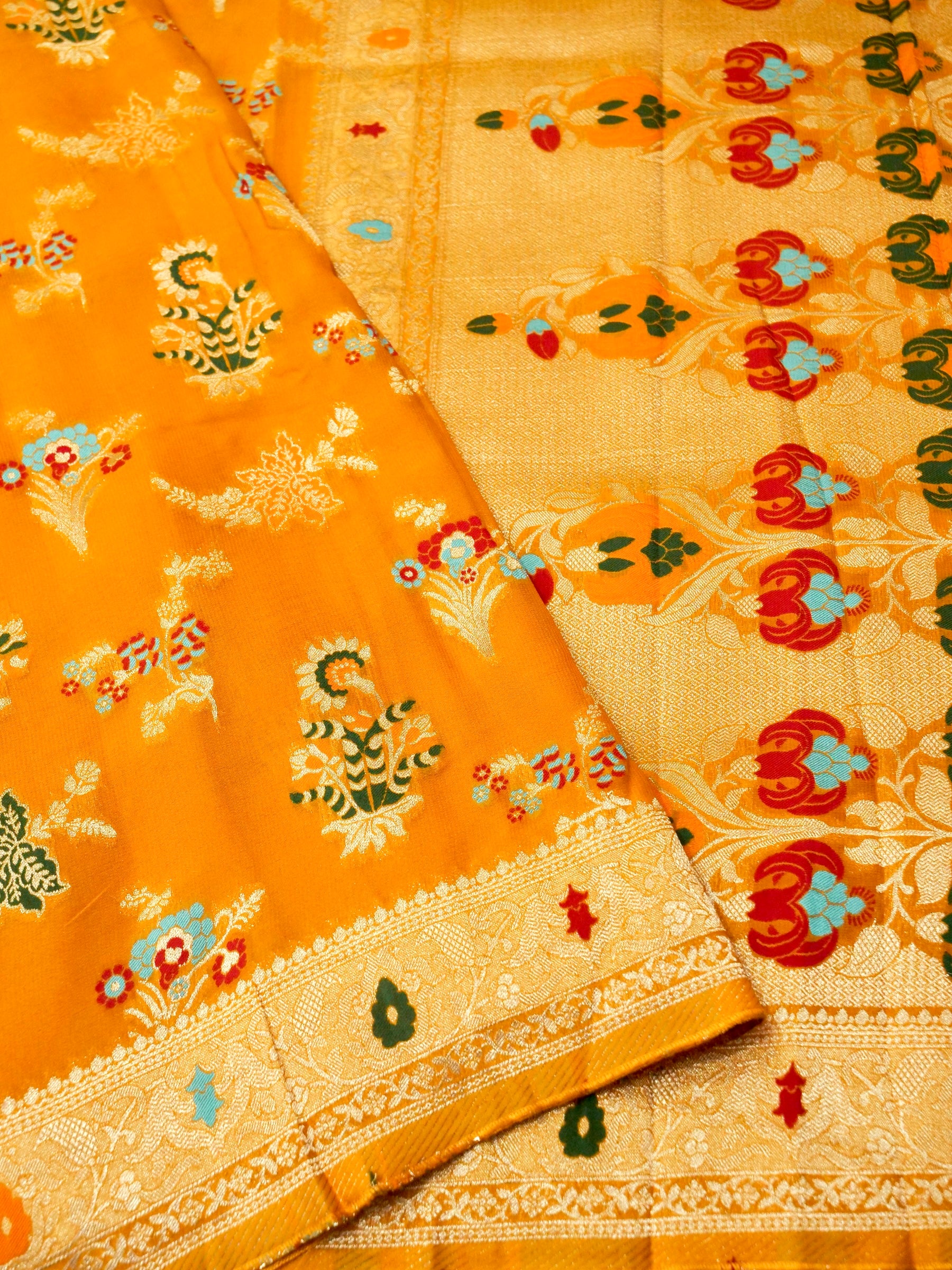 Mustard Orange Crepe Georgette Silk Saree with Champagne Gold Border