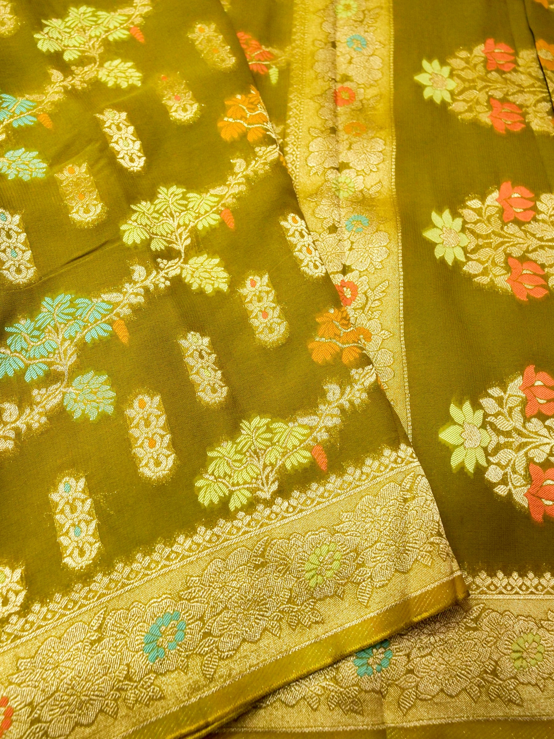 Moss Green Crepe Georgette Silk Saree with Champagne Border