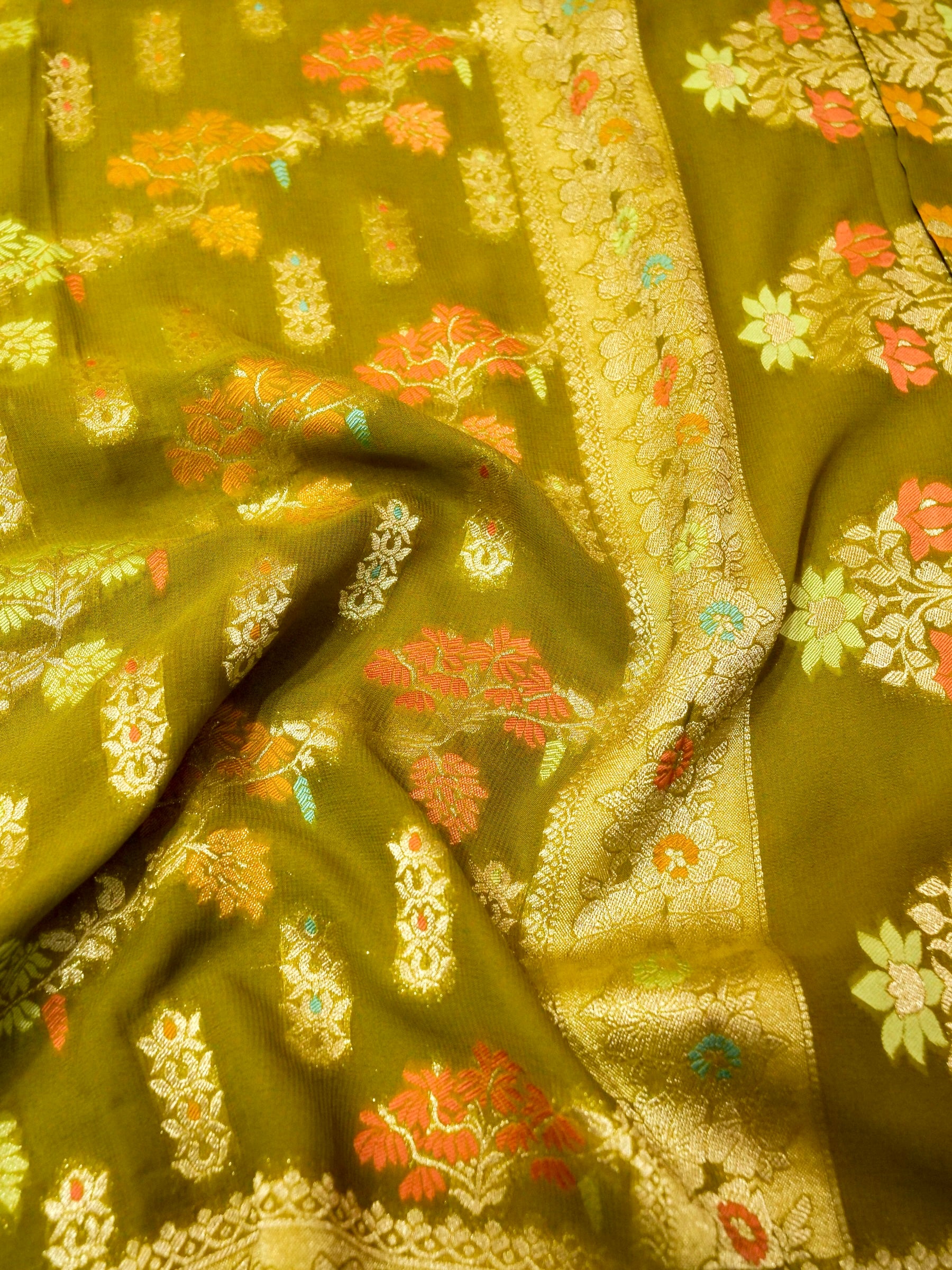 Moss Green Crepe Georgette Silk Saree with Champagne Border
