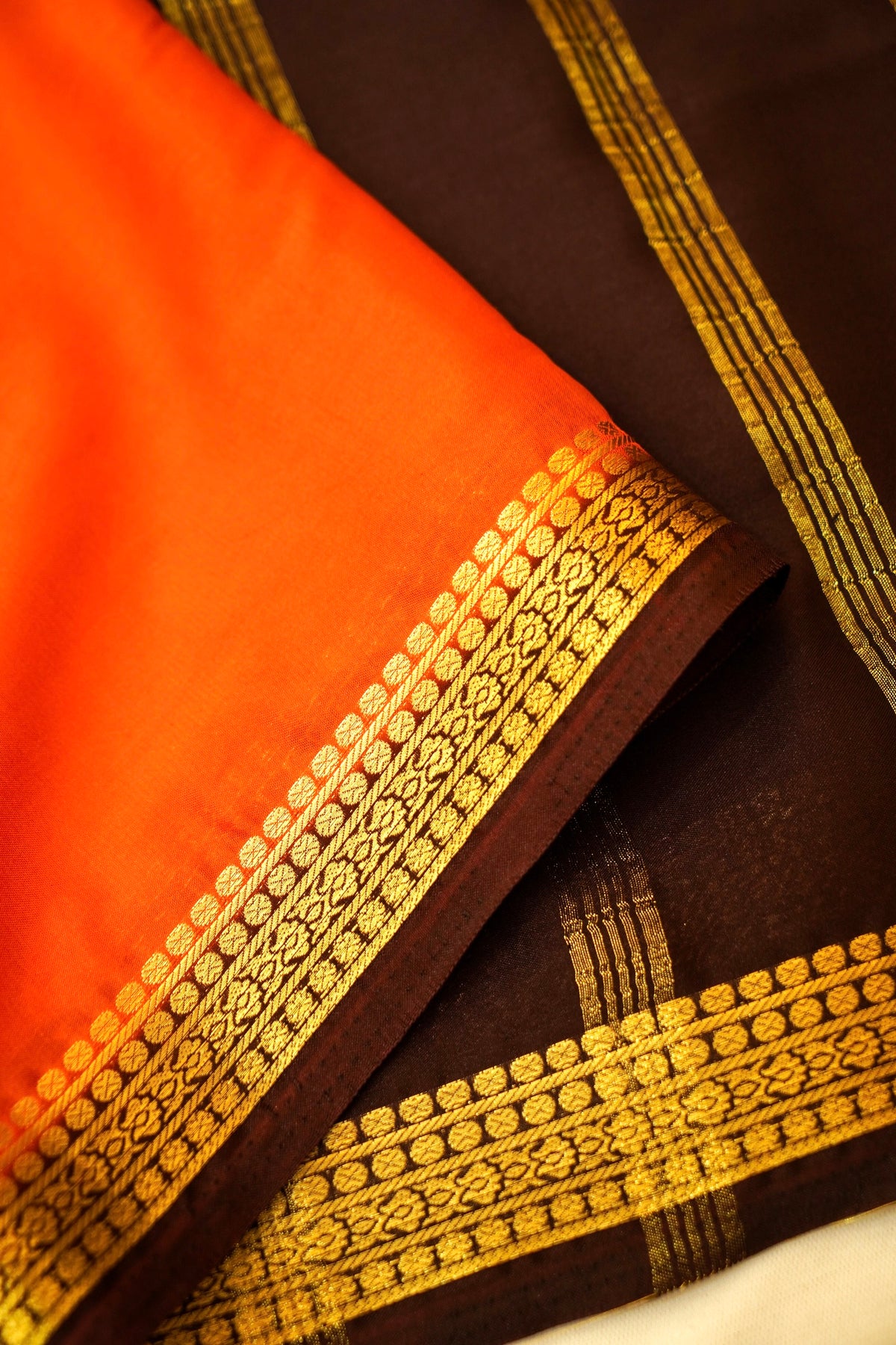 Maithili - Orange Mysore Crepe Silk Saree with Dark Brown Border