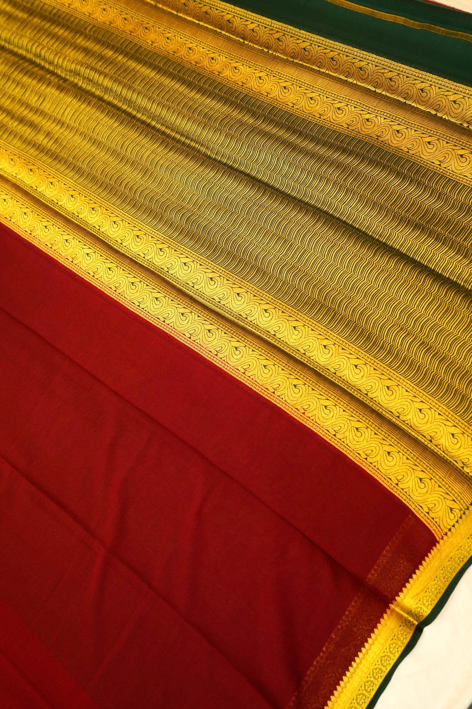 Maithili - Dark Brown Mysore Crepe Silk Saree with Green Border