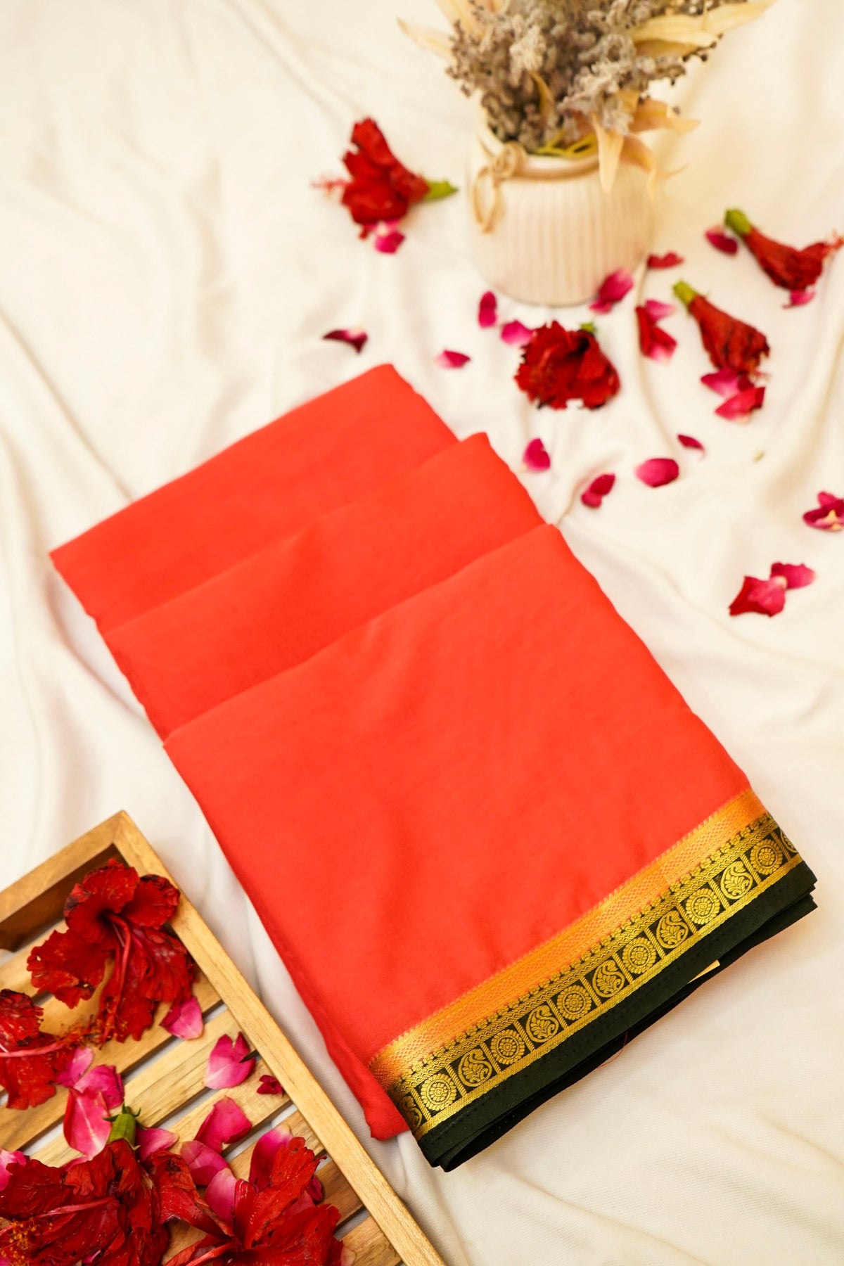 Maithili - Coral Red Mysore Crepe Silk Saree with Black Border