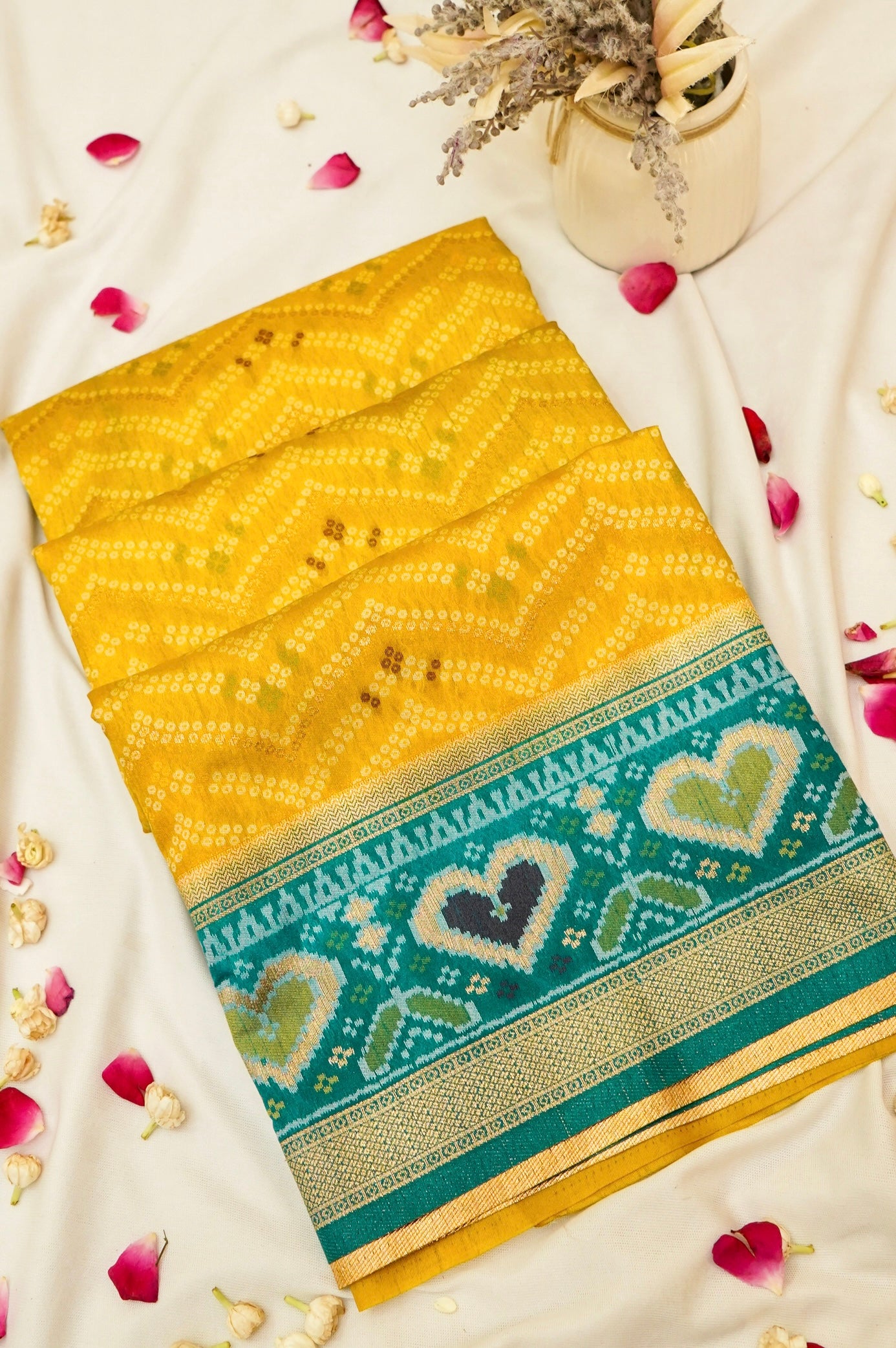 Mustard Yellow Ikkat Patola Silk Saree with Teal Border and Stitched Blouse