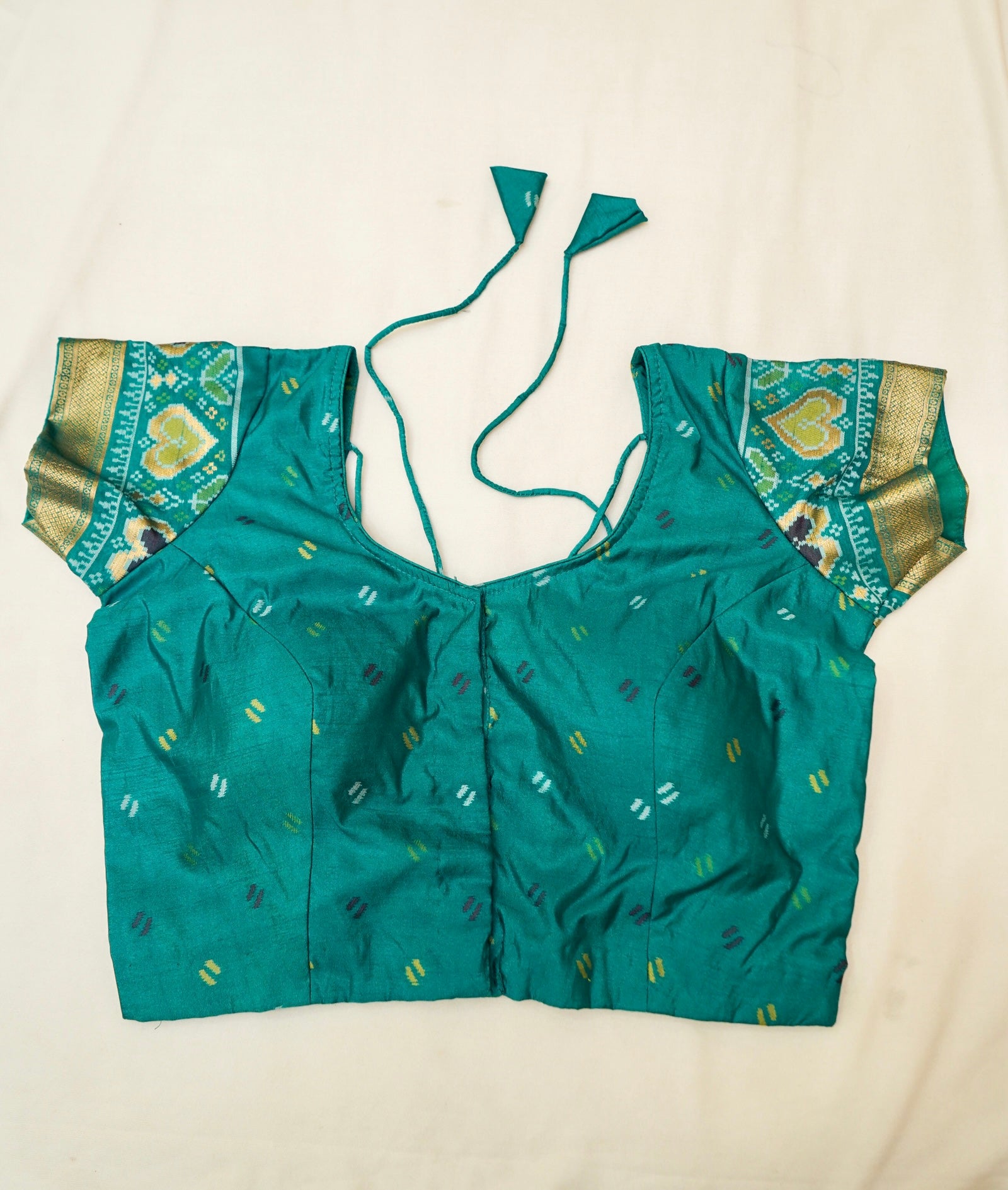Ivory Ikkat Patola Silk Saree with Teal Border and Stitched Blouse